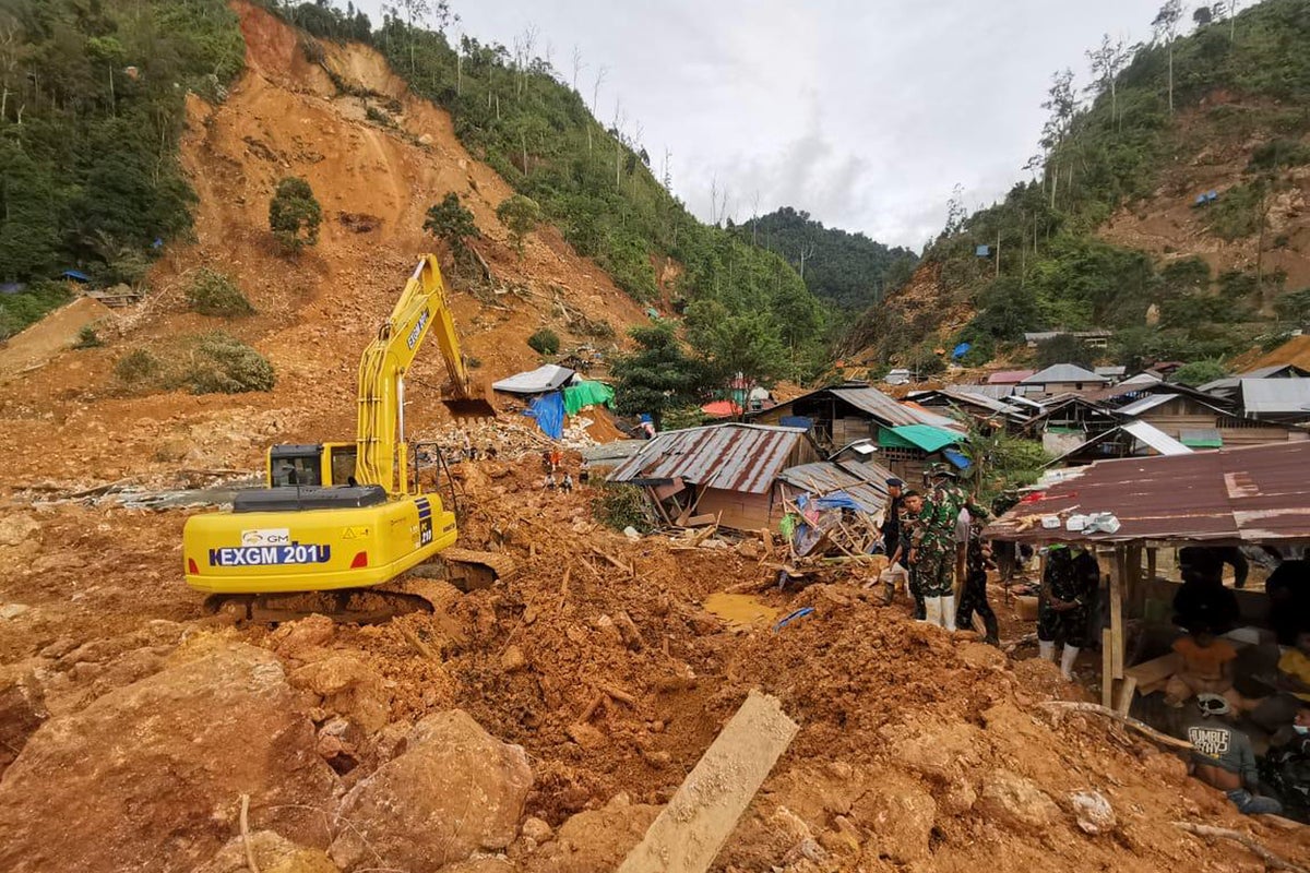 Search intensifies for dozens buried in Indonesian landslide that killed at least 23