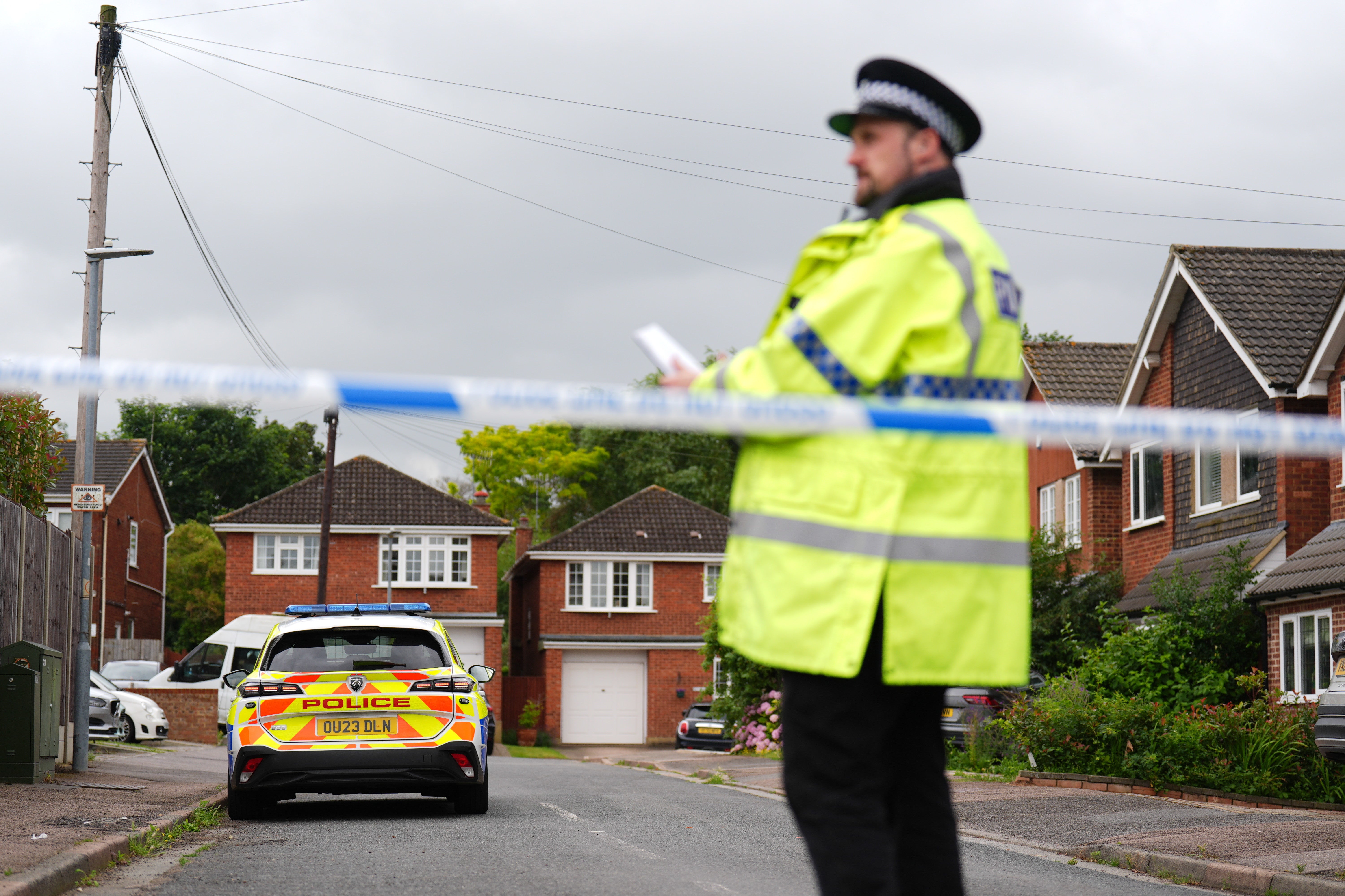 Police at the scene in Ashlyn Close, Bushey (James Manning/PA)