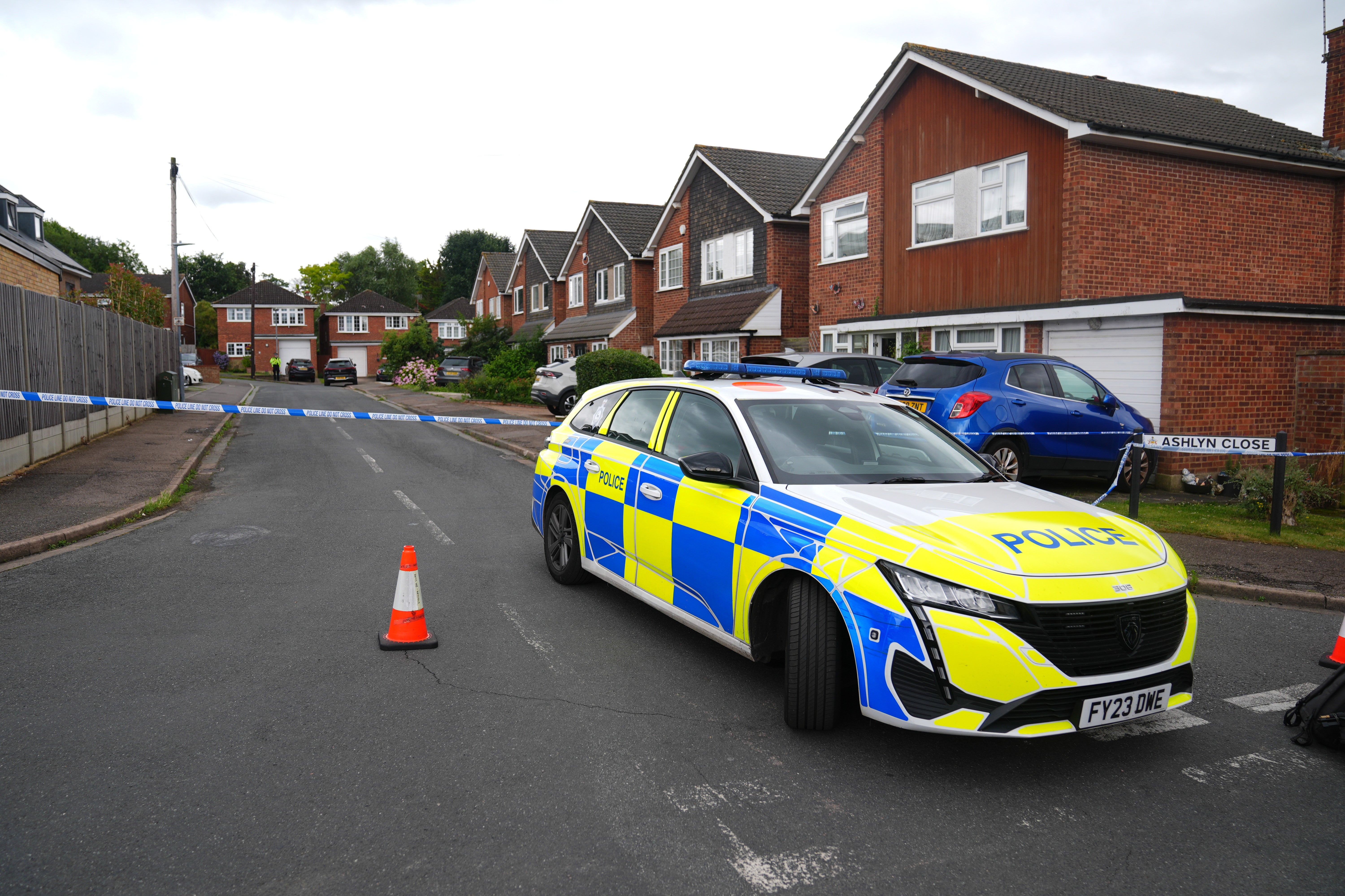 Residents described the ‘absolute chaos’ as armed police arrived in the street (James Manning/PA)