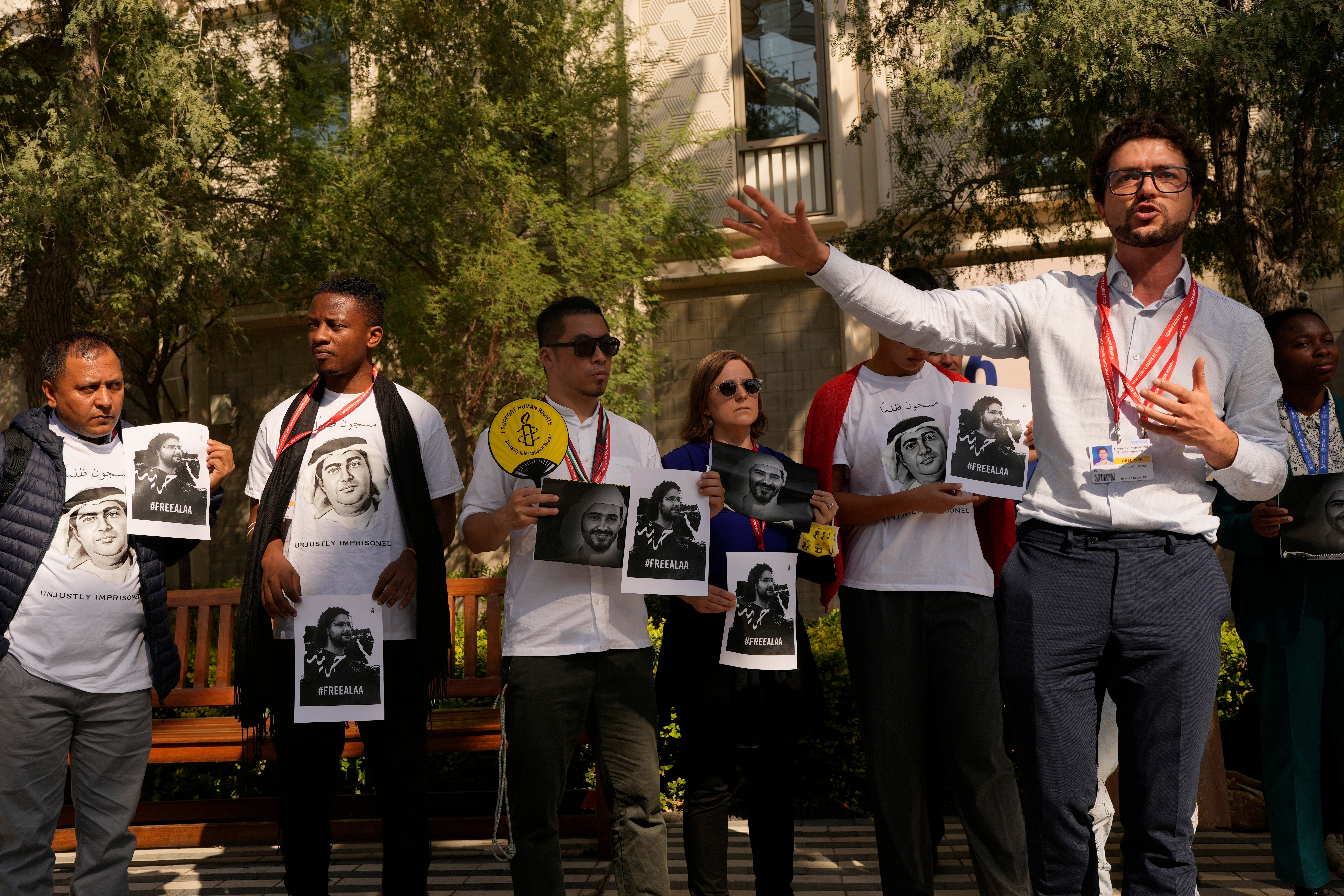 File. Activists hold a demonstration for jailed Egyptian activists Alaa Abdel-Fattah and Mohamed al-Siddiq in 2023. A mass trial in the UAE of dissidents ended on 10 July 2024 with dozens of people sentenced to life in prison
