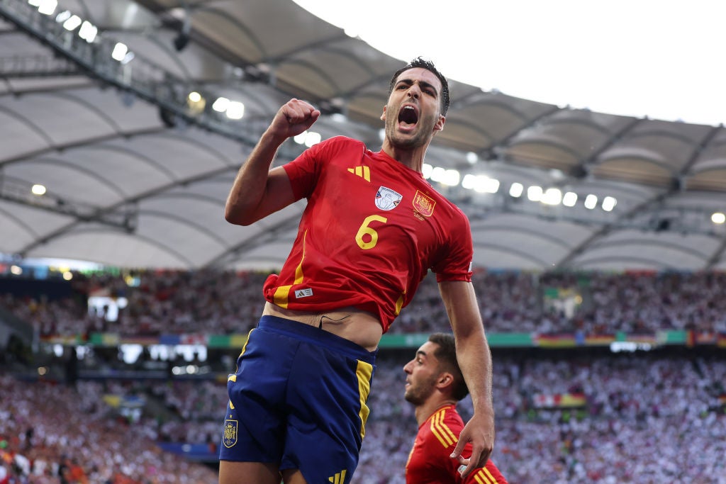 Spain’s Mikel Merino celebrates his dramatic late winner against Germany