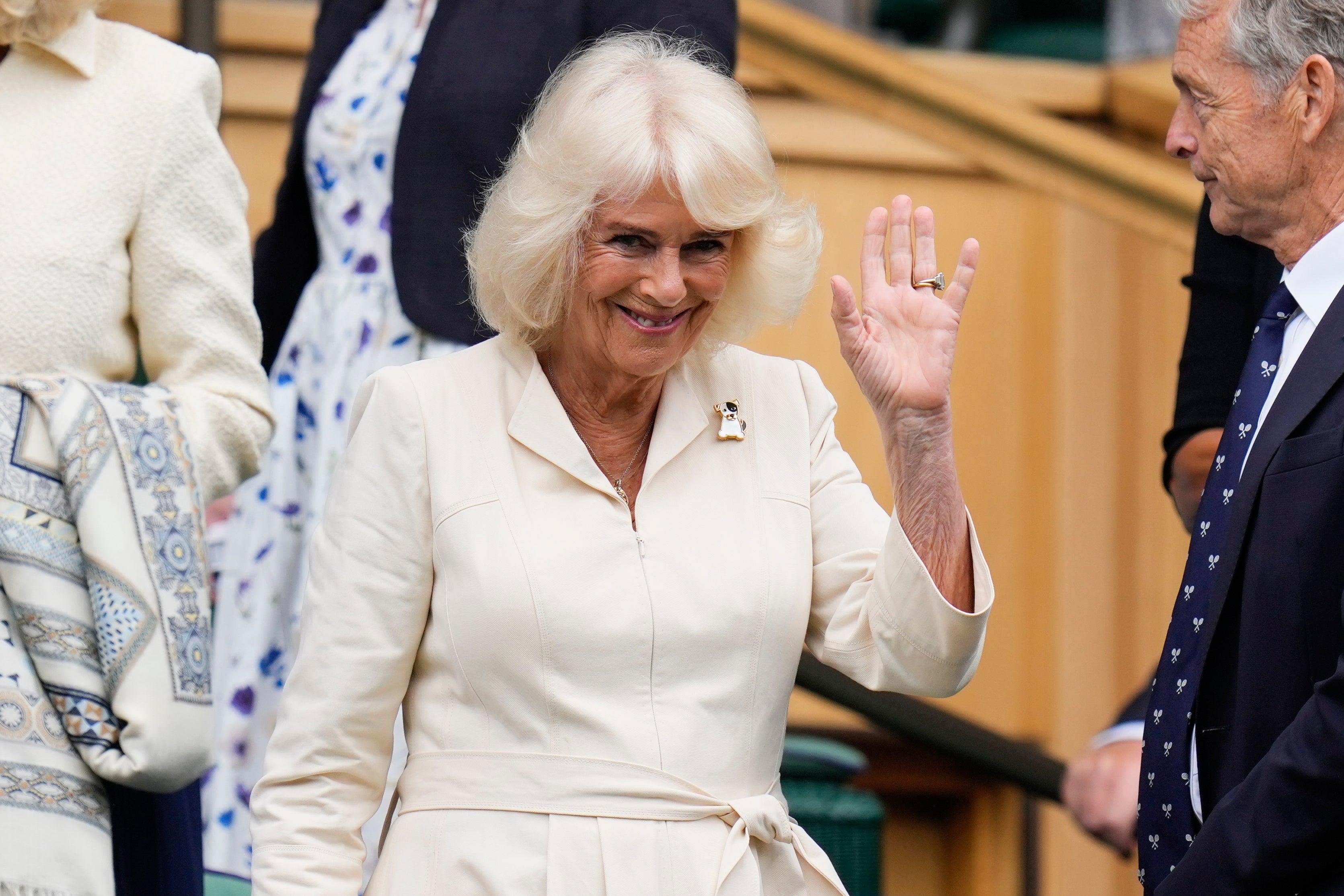 The Queen waved to onlookers at the tournament.