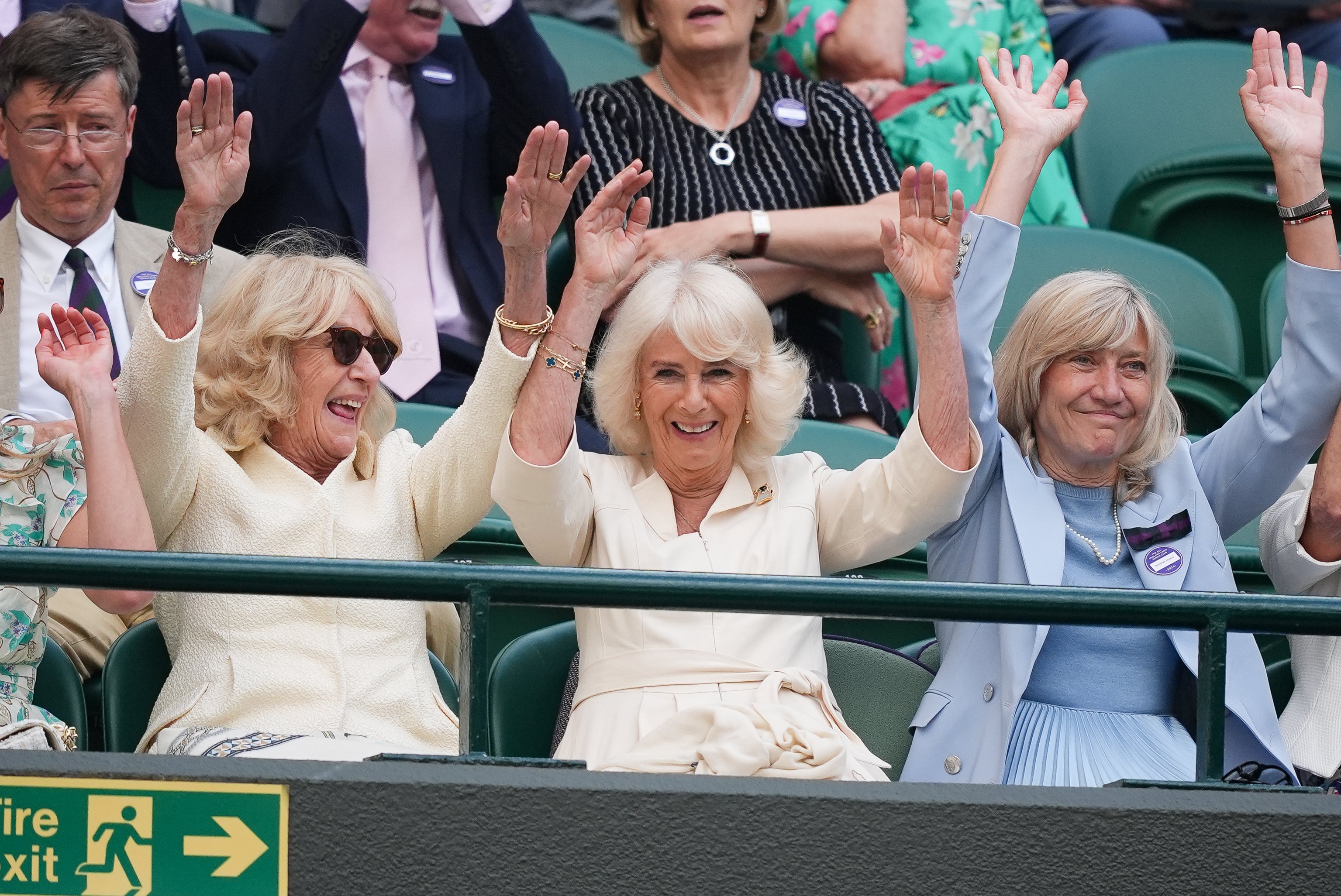 The Queen, centre, joins in a Mexican wave on Court One (Jordan Pettitt/PA)