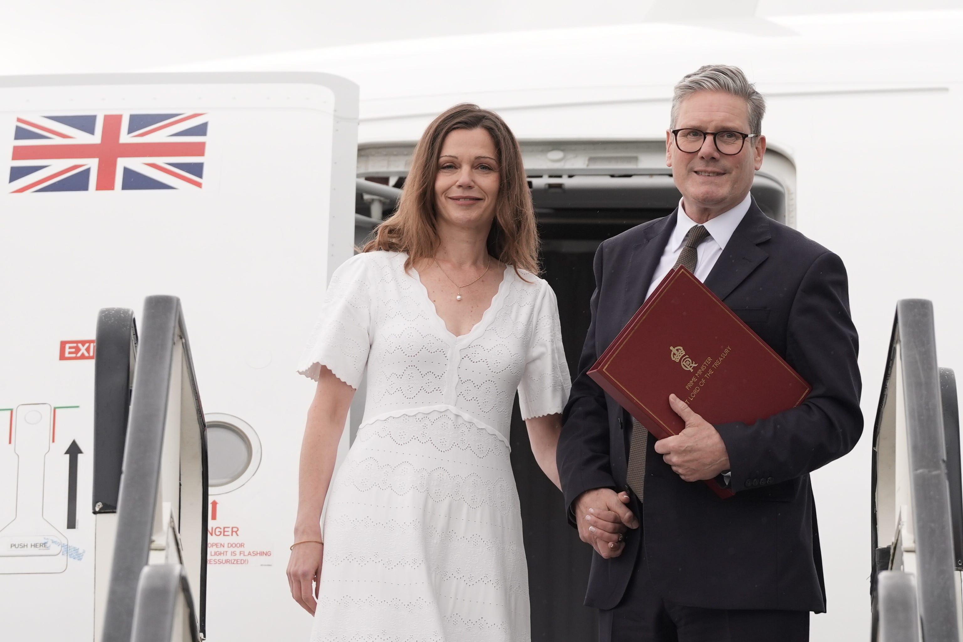 Prime Minister Sir Keir Starmer and his wife Victoria board a plane for Washington (Stefan Rousseau/PA)