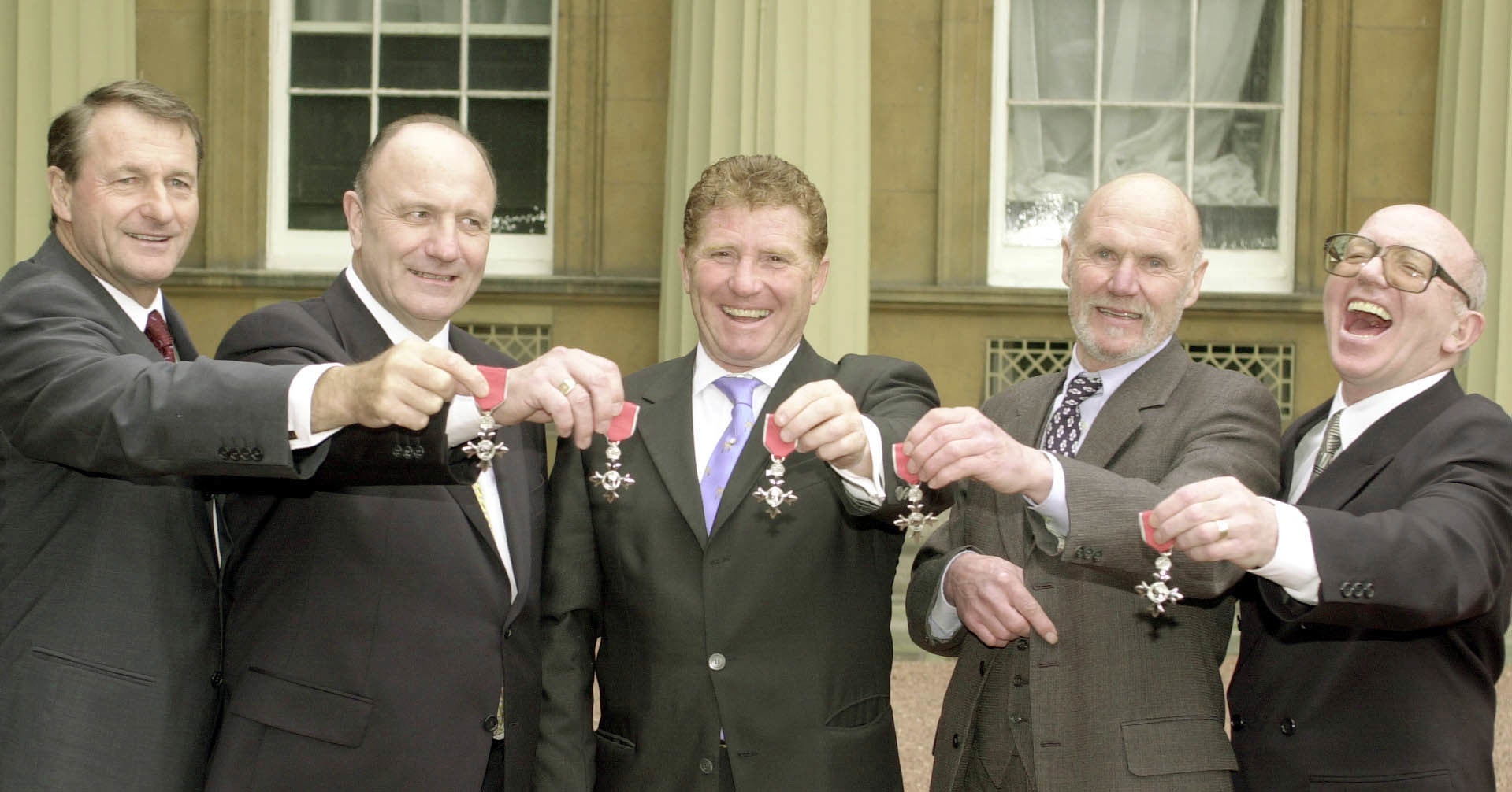 Alan Ball, centre, became an MBE in 2000 alongside fellow World Cup winners, left to right, Roger Hunt, George Cohen, Ray Wilson and Nobby Stiles (PA)