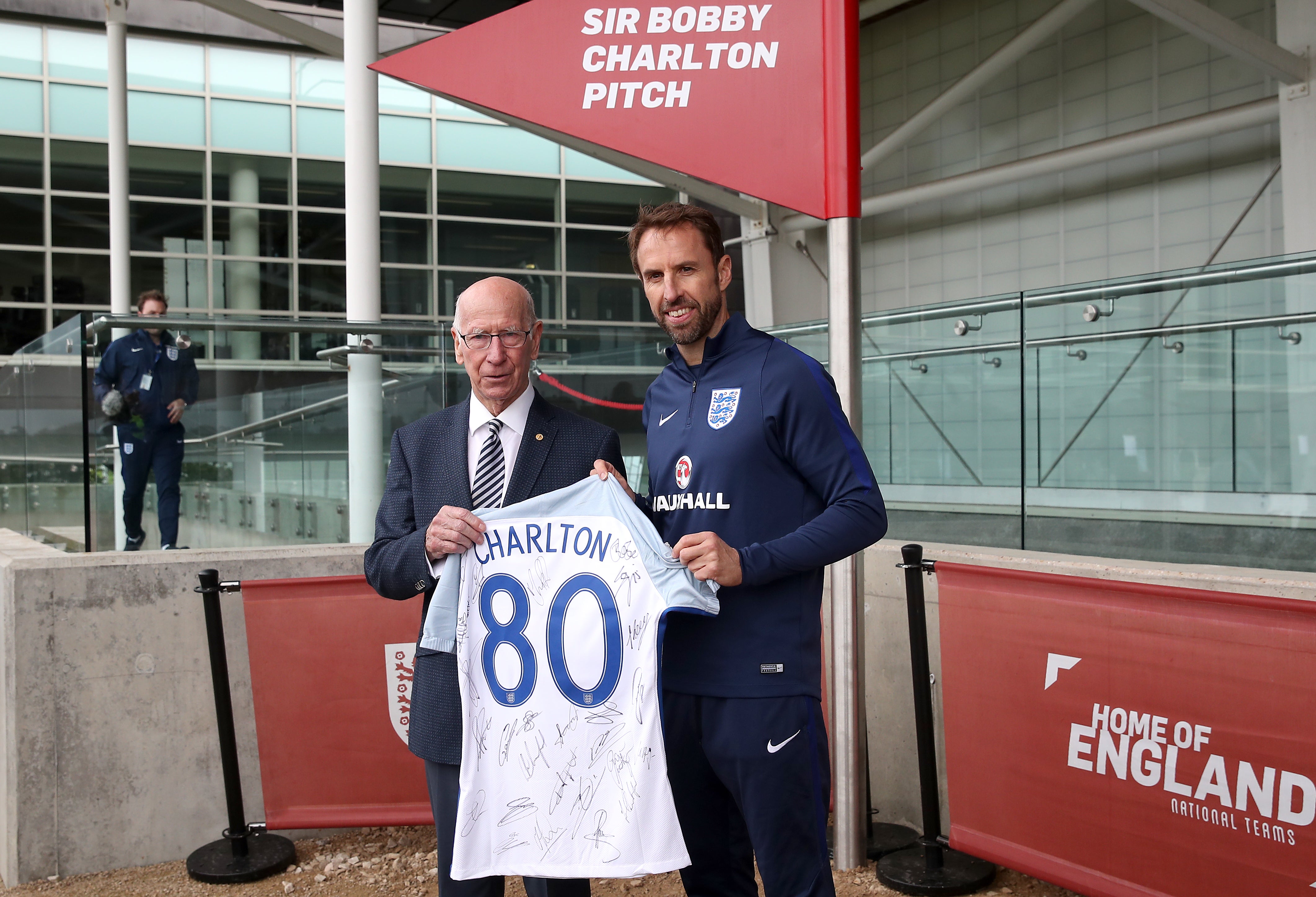Sir Bobby Charlton, left, was presented with an England shirt to mark his 80th birthday in 2017 by current manager Gareth Southgate (Nick Potts/PA)