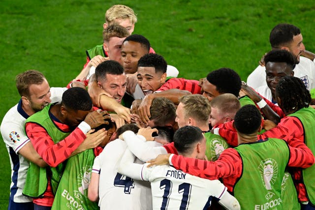 <p>England players celebrate their late win over Netherlands in the Euro 2024 semi-finals</p>