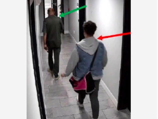 <p>Murder suspect Audrey Miller walking behind the victim, Fasil Teklemariam, toward the elevator in his building on the day he was killed </p>