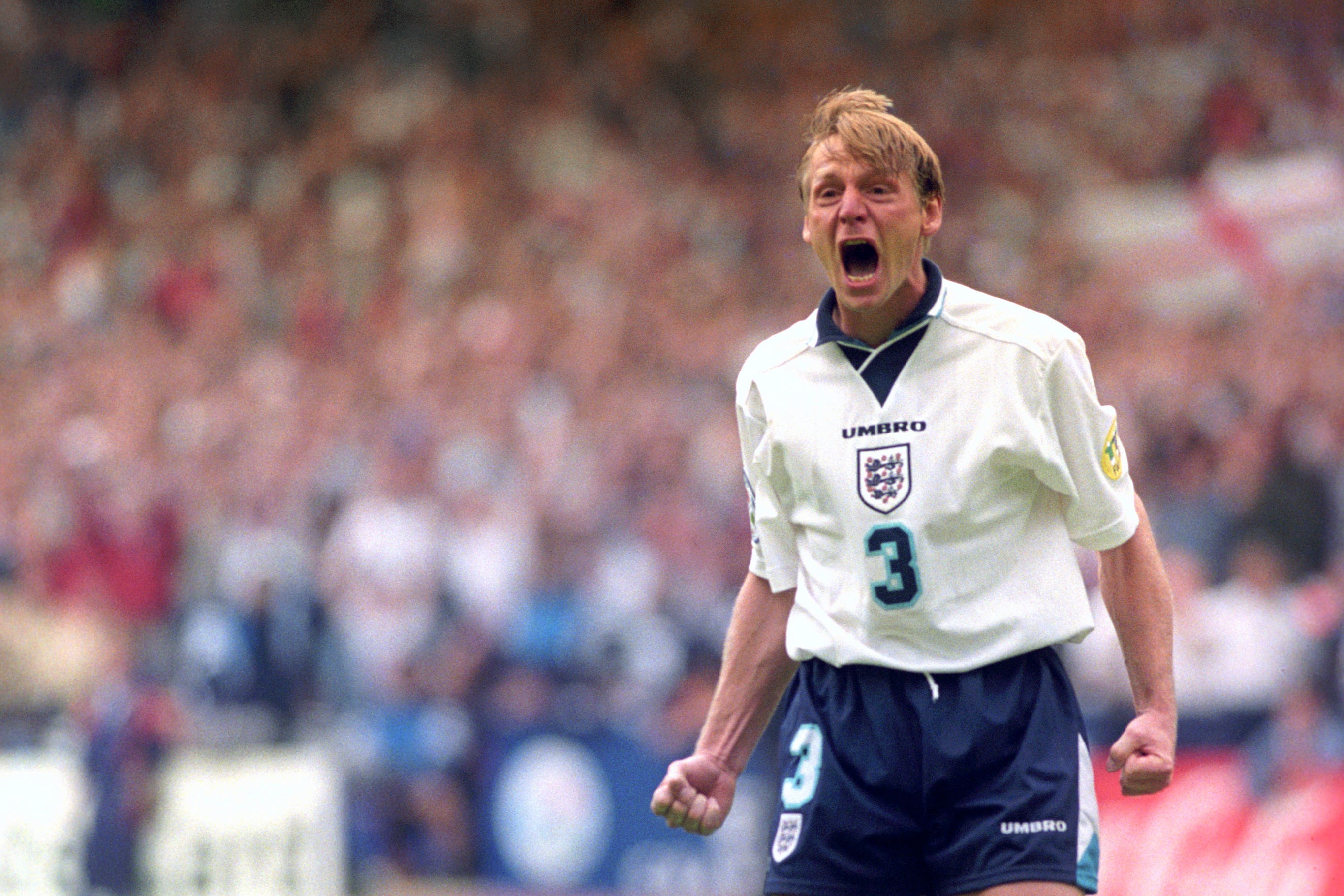 Stuart Pearce celebrates scoring his penalty against Spain at Euro 96 (Sean Dempsey/PA)