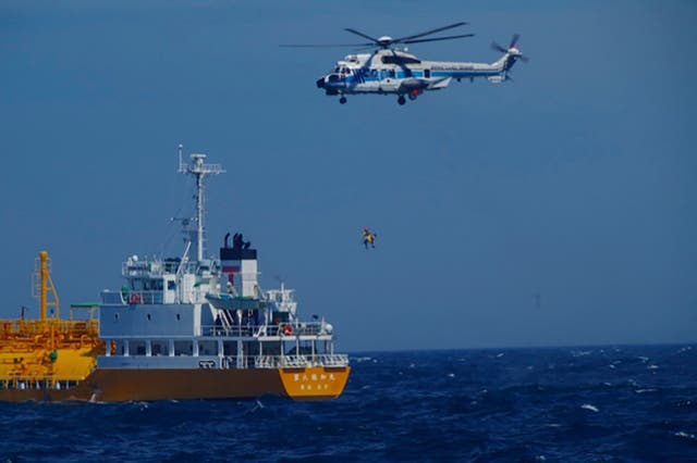 <p>The woman is airlifted by a coast guard helicopter on 10 July 2024</p>