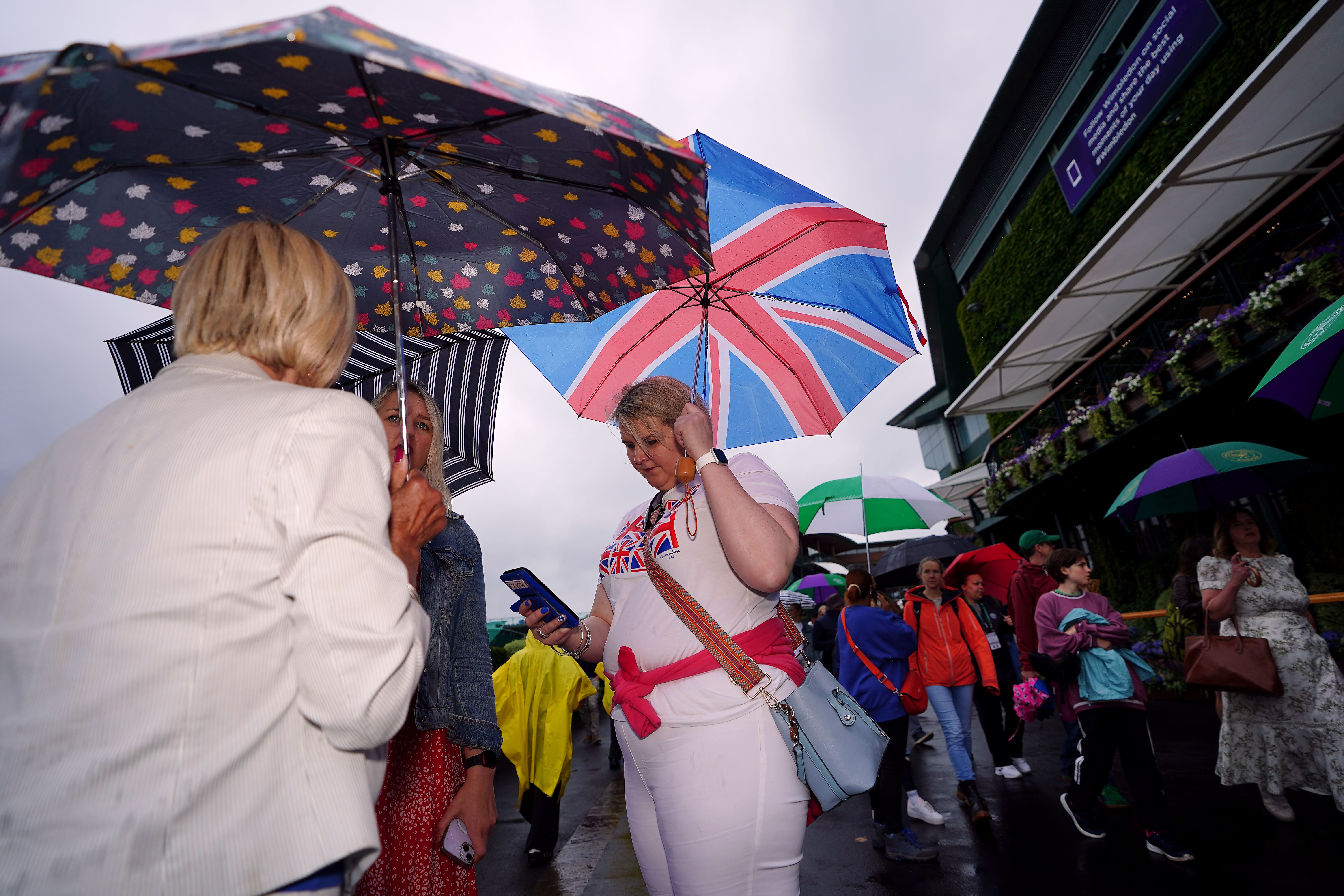 Conditions are set to improve after a disappointing start to July saw ‘terrible’ weather blamed for low crowd turnout at Wimbledon (Zac Goodwin/PA)