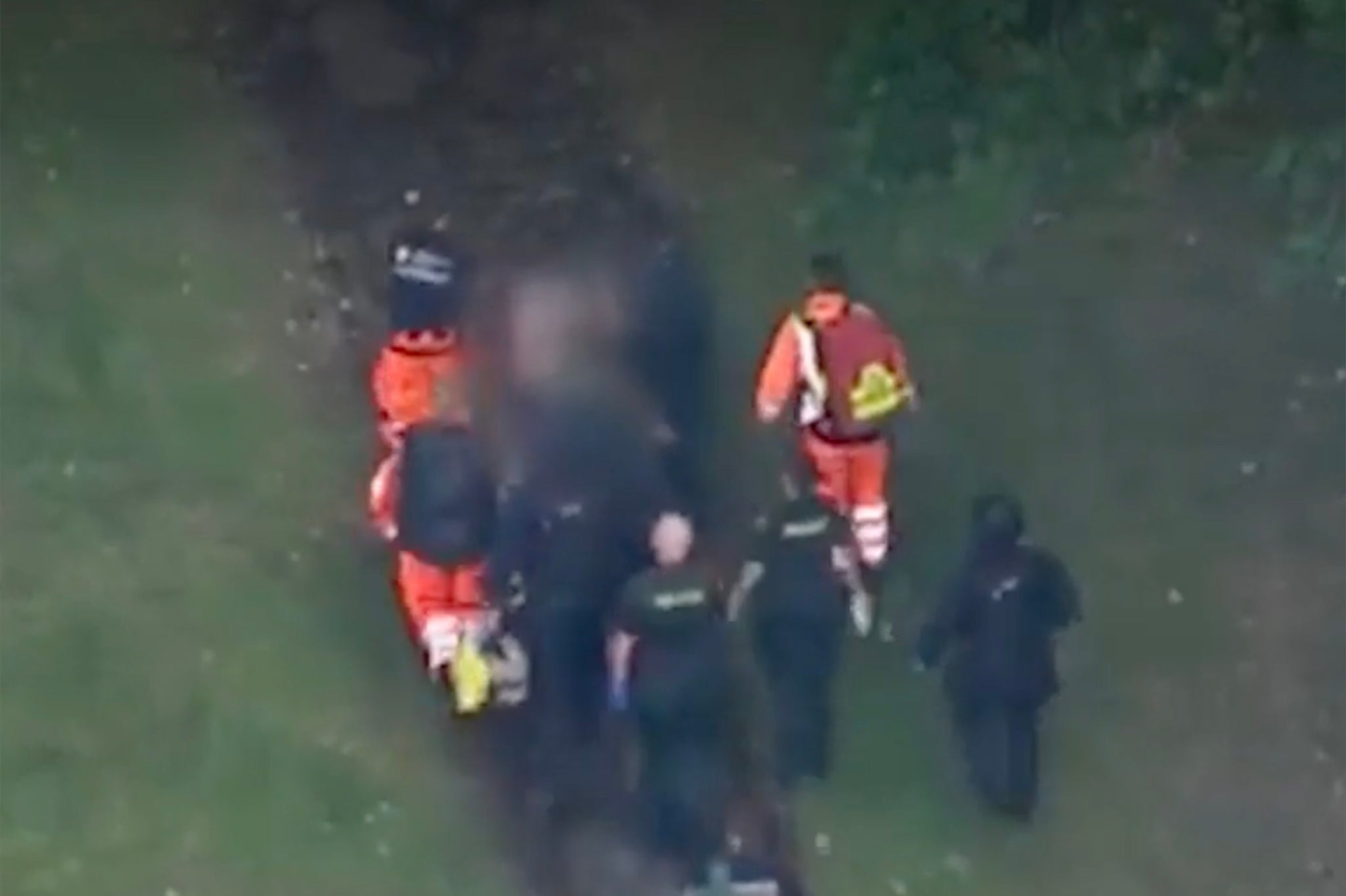Aerial footage appeared to show Kyle Clifford being stretchered from a cemetery in Enfield