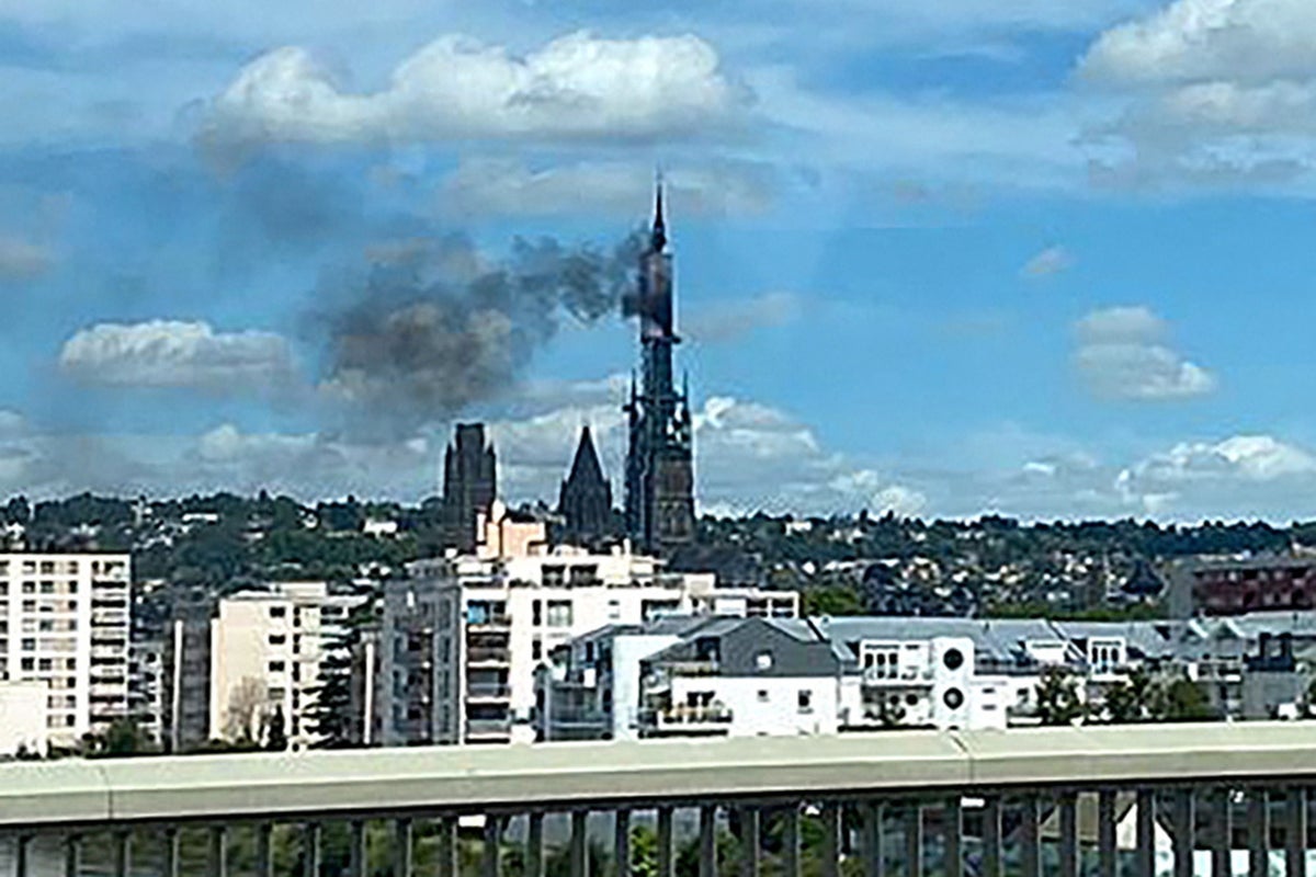 Smoke billows from Rouen Cathedral after spire catches fire