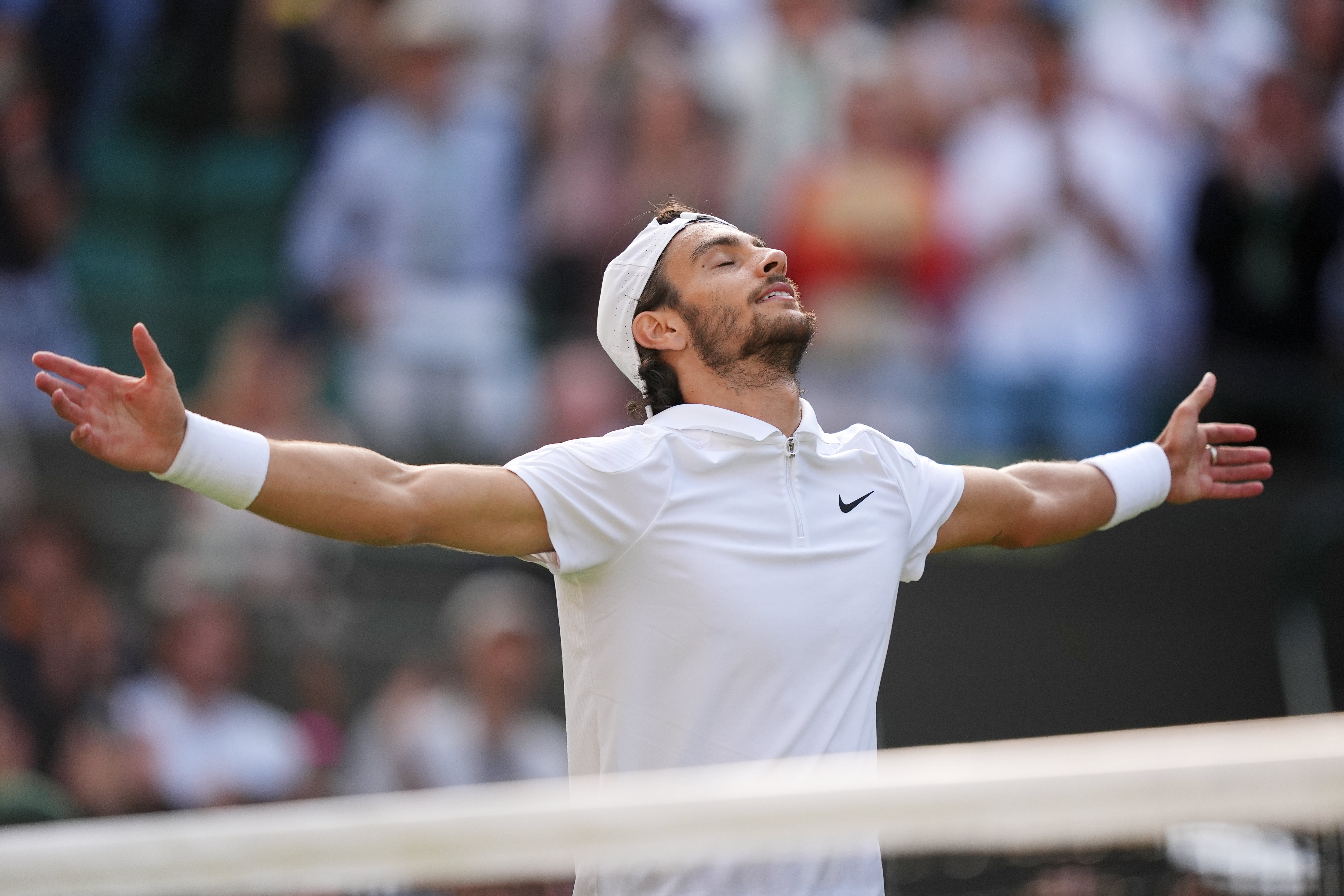 Lorenzo Musetti is through to his first grand slam semi-final (Jordan Pettitt/PA)