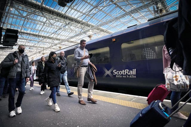The RMT union is to ballot ScotRail workers on industrial action, as well as workers on the Caledonian Sleeper rail services (Jane Barlow/PA)
