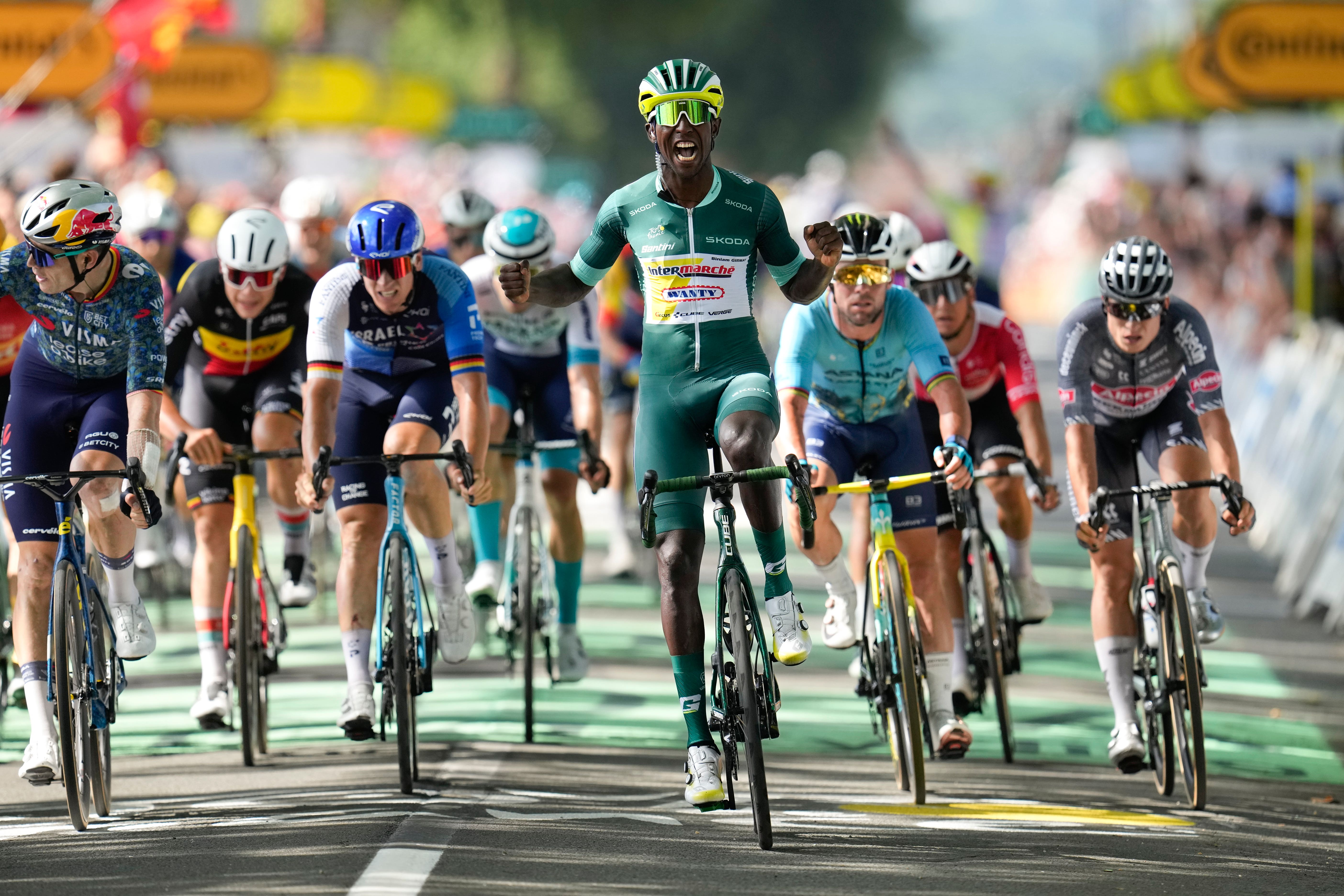 Biniam Girmay celebrates his third win of the Tour de France on stage 12 (Jerome Delay/AP)