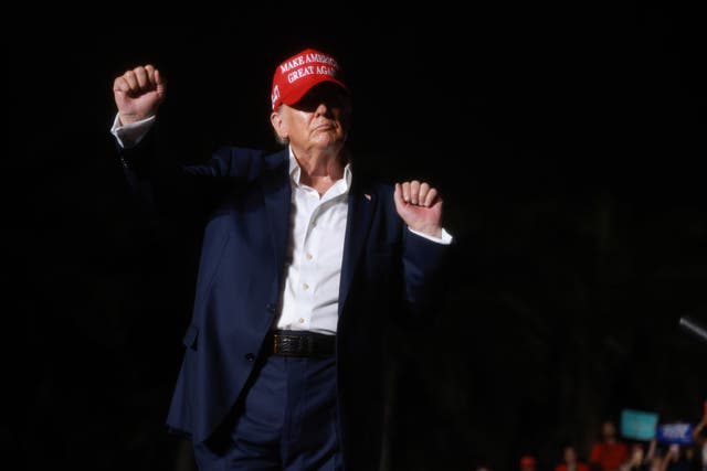 <p>Donald Trump dances onstage during his July 9, 2024, campaign rally at his golf resort in Miami, Florida</p>