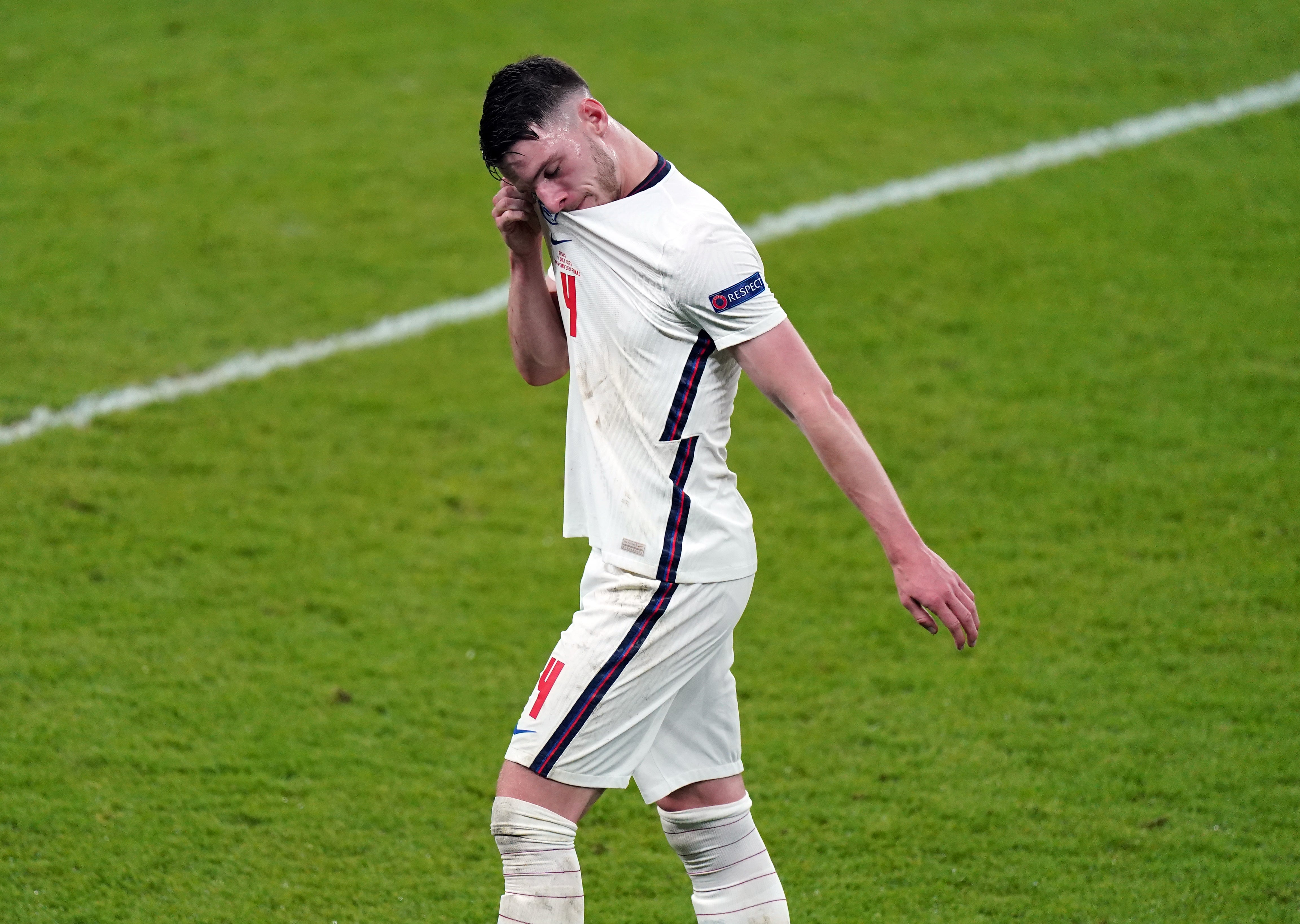 England’s Declan Rice walks off dejected as he is substituted during the UEFA Euro 2020 final against Italy. (Mike Egerton/PA)