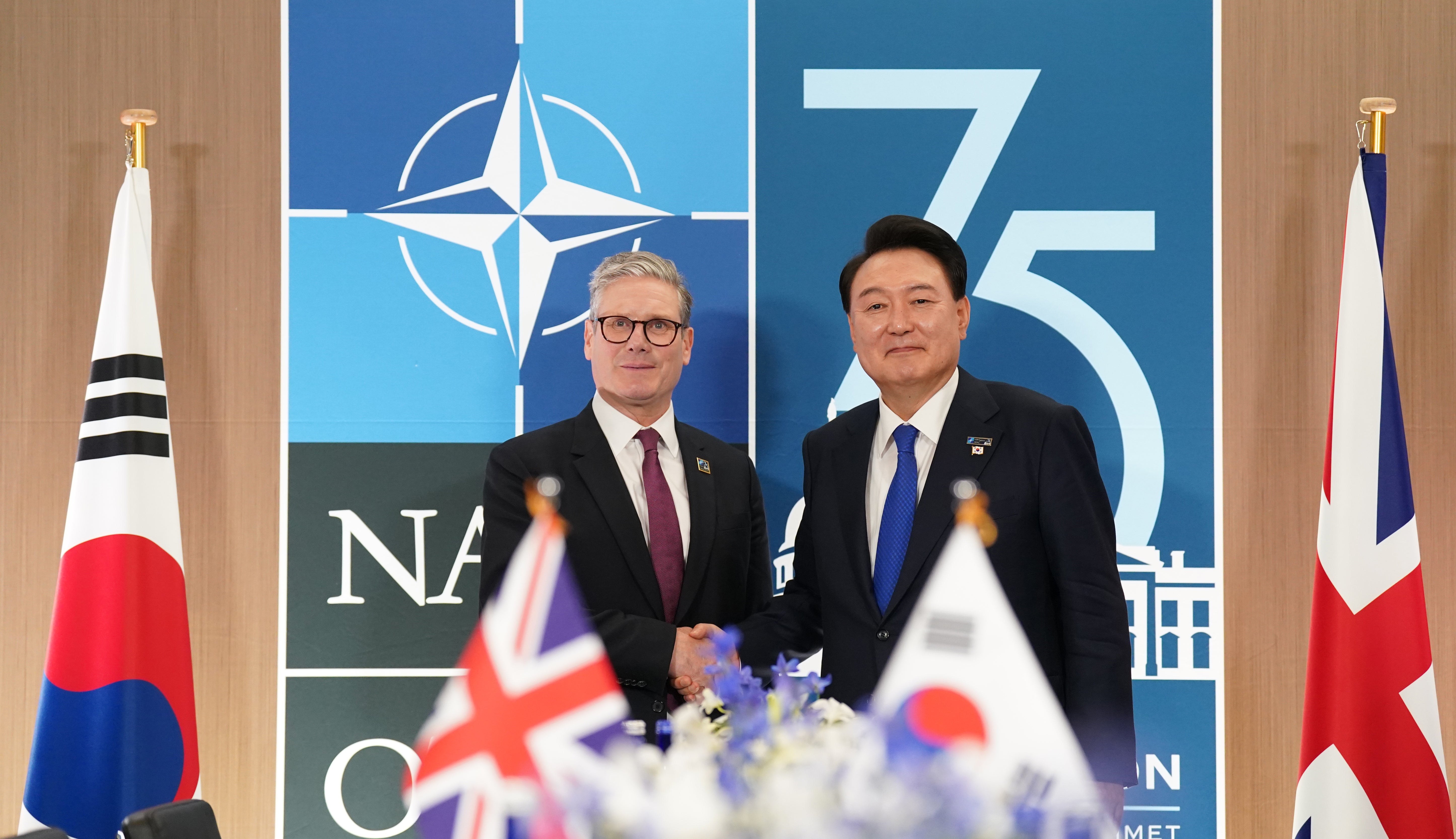 Prime Minister Sir Keir Starmer (left) meeting President of South Korea, Yoon Suk Yeol, for a bilateral meeting (Stefan Rousseau/PA)