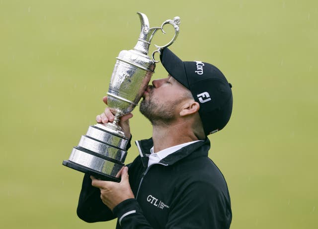 <p>Brian Harman kisses the Claret Jug after winning The Open at Royal Liverpool last year (Richard Sellers/PA)</p>