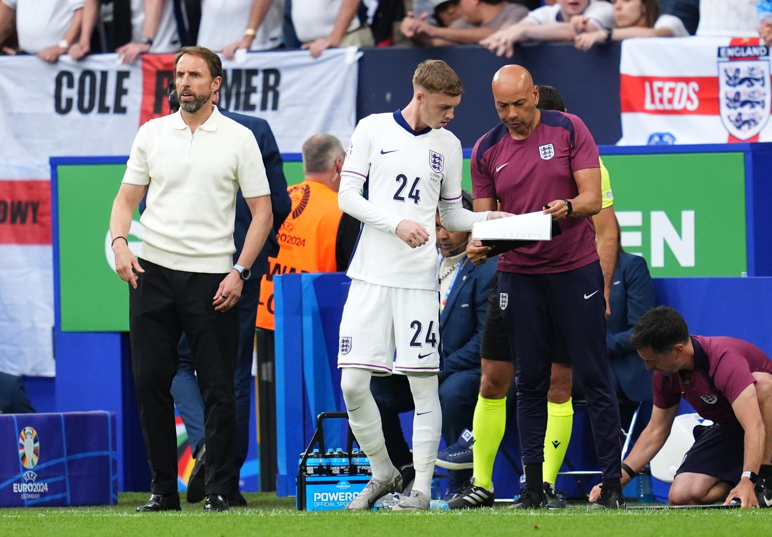 England boss Paul Nevin gives Cole Palmer instructions before he came on against Slovakia in the Euro 2024 round of 16 (Adam Davy/PA)