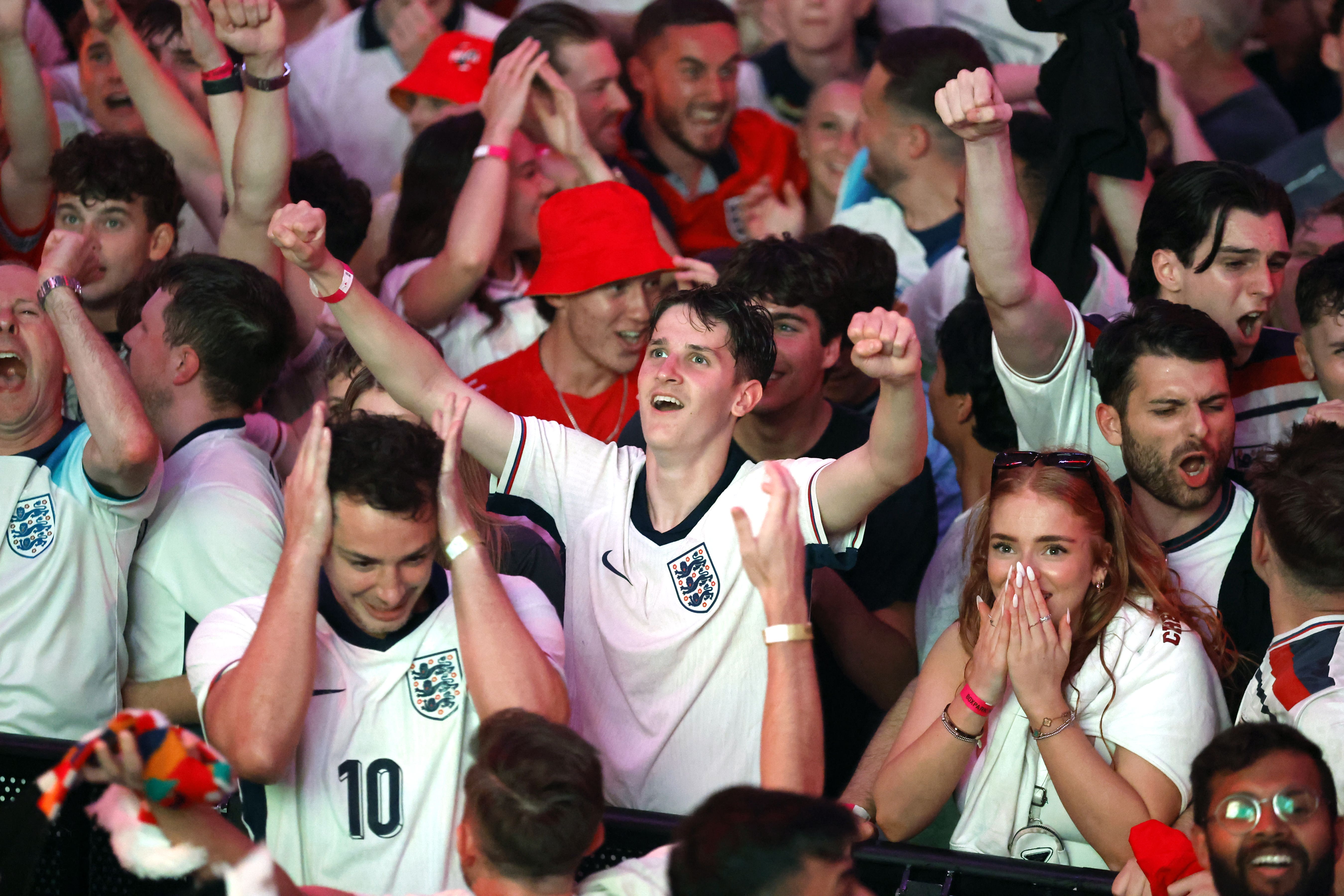 England fans celebrate their team's second goal at BOXPark Wembley, London, during a screening of the Euro 2024 semi-final match between England and the Netherlands (Nigel French/PA)