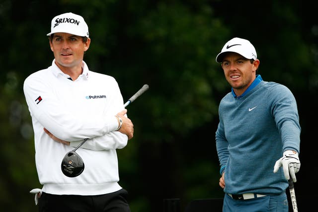 <p>Rory McIlroy (right) believes that it would be impossible for Keegan Bradley to both captain and play at the Ryder Cup </p>