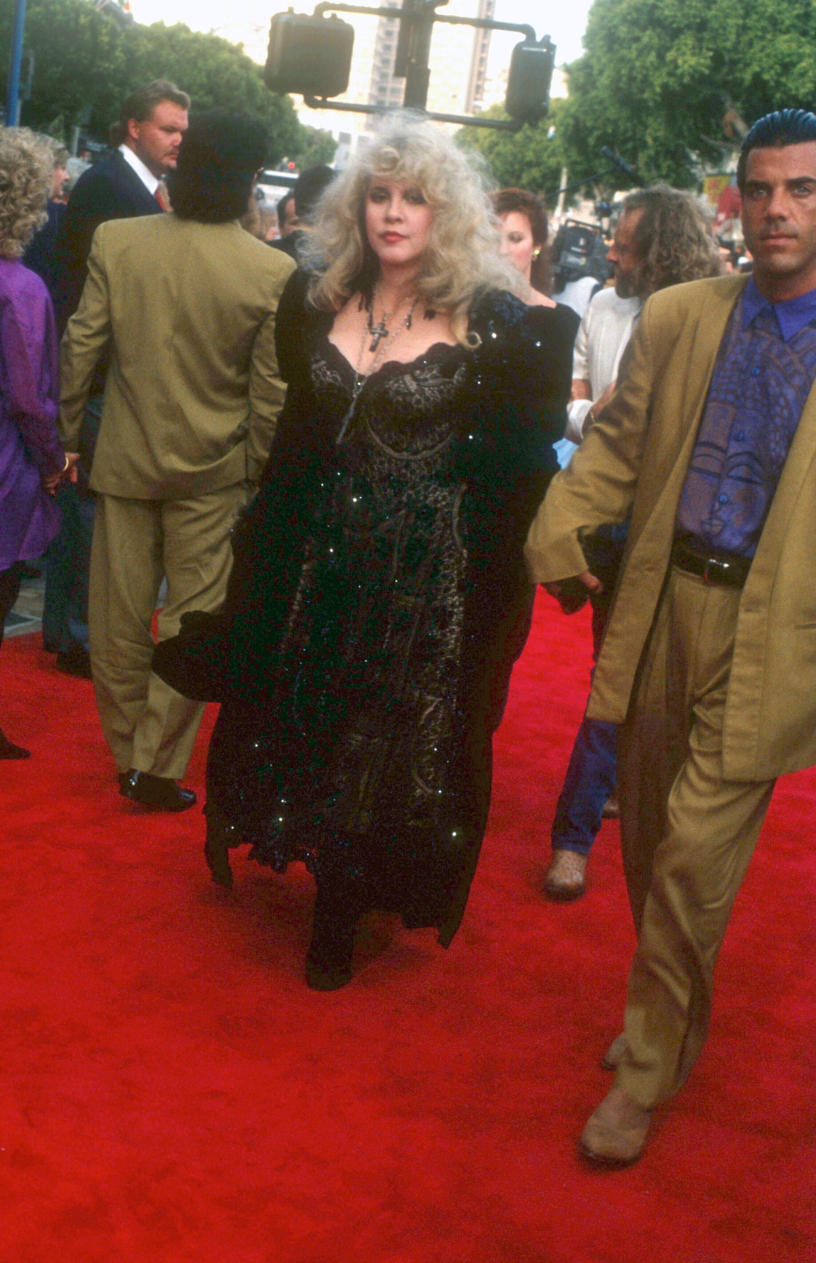 Stevie Nicks began to wear more layers disguising weight gain which she was criticized for by the media (Alamy/PA)