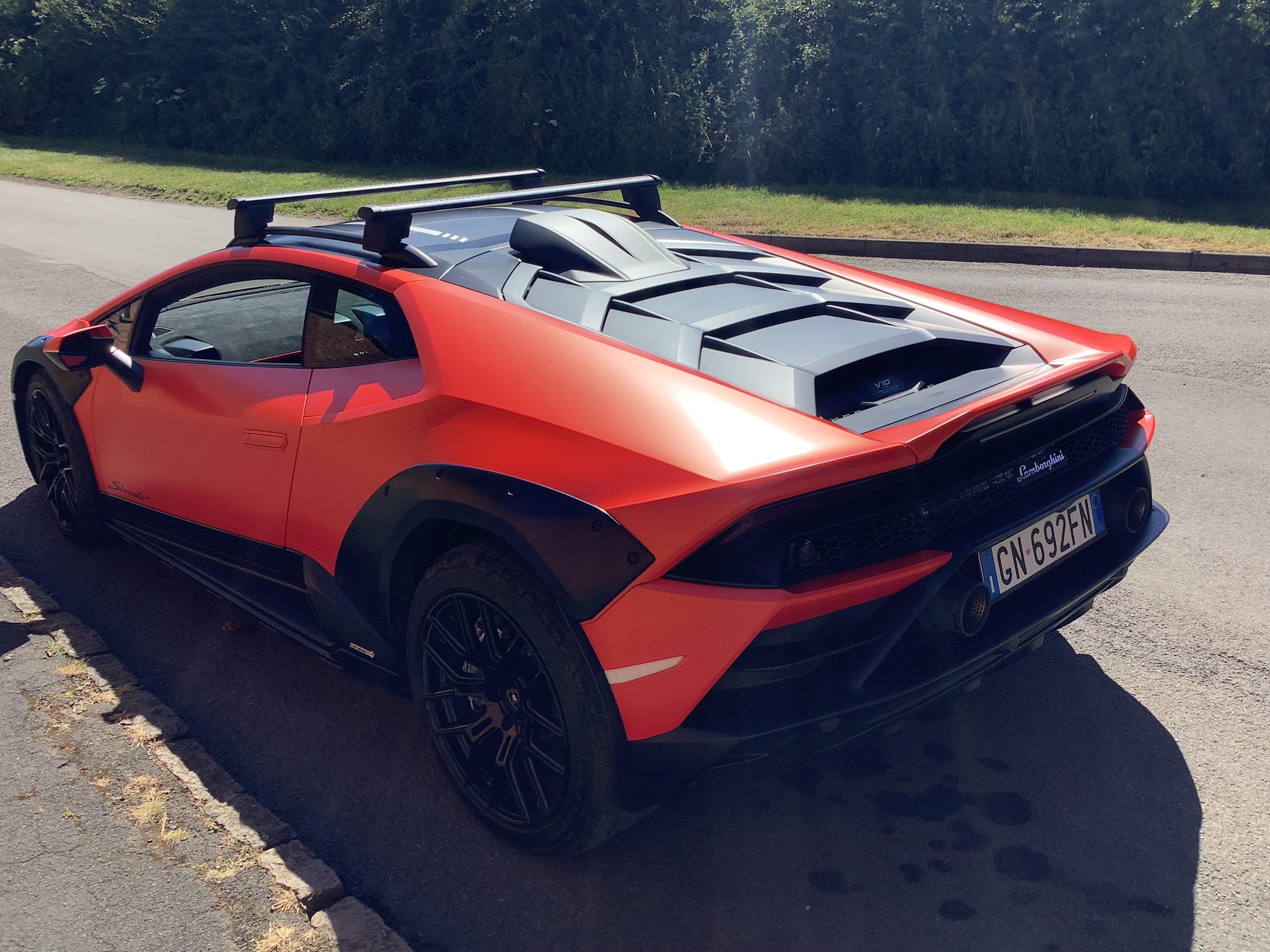 The roof rack added a touch of humor to the half-hearted off-road look.