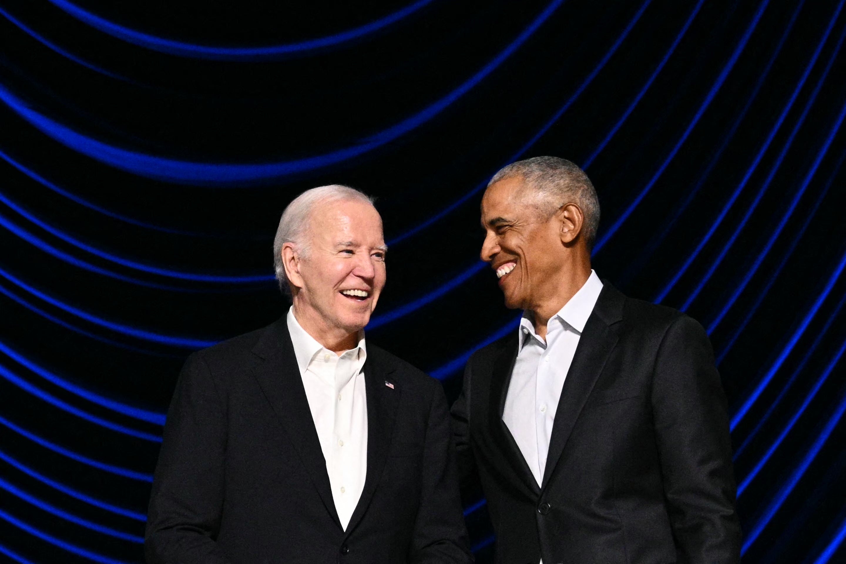 Joe Biden and Barack Obama appear at a fundraiser in Los Angeles on June 15.