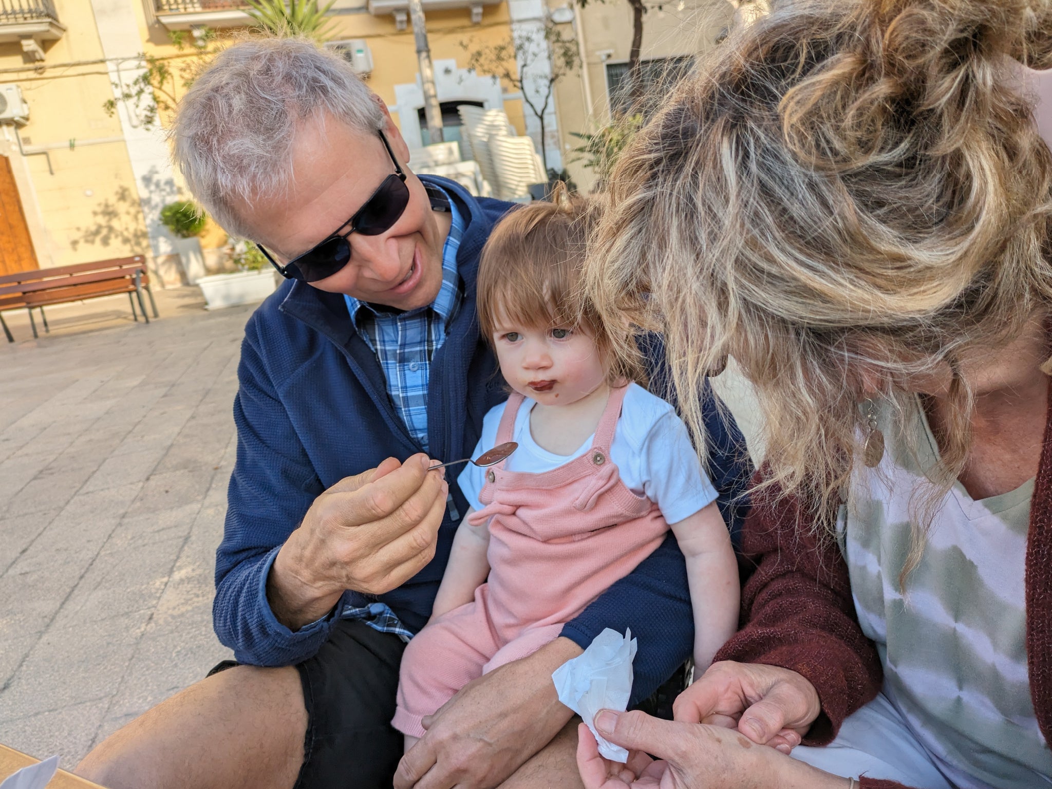 Charlotte’s daughter enjoying gelato with her grandparents