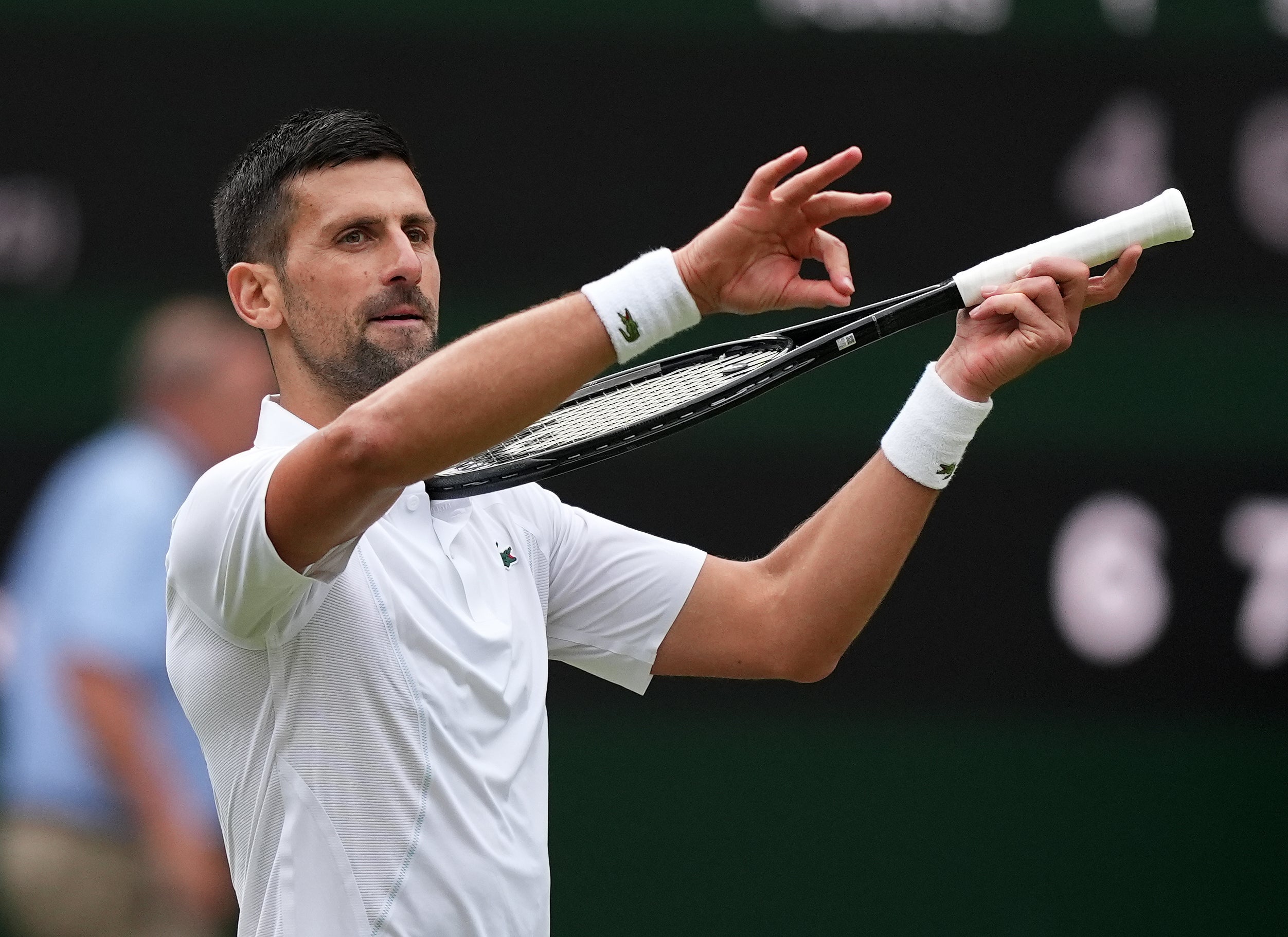 Novak Djokovic once again pretended to play the violin in a celebration for his daughter Tara after a straight-sets win over Lorenzo Musetti on Friday