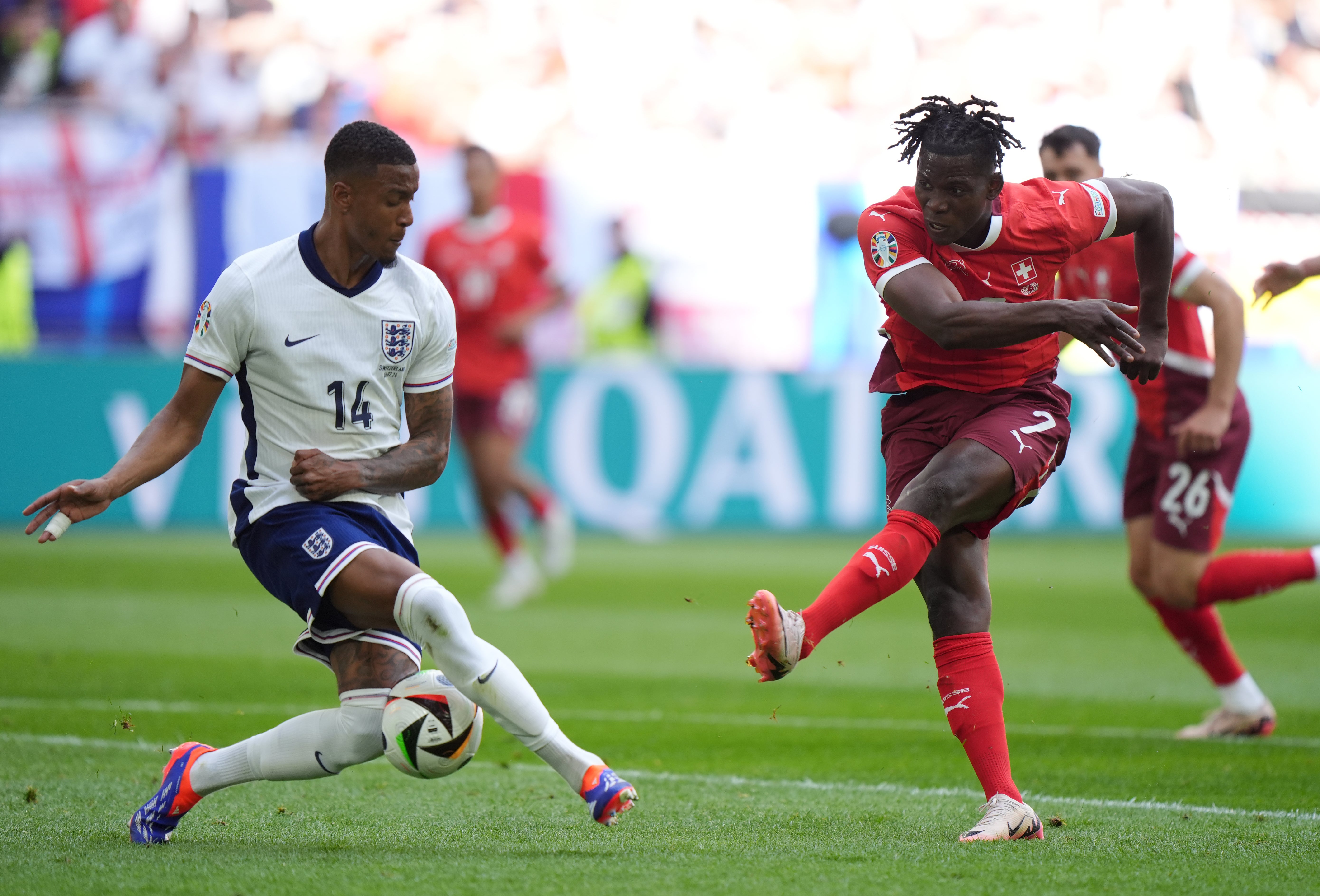 England’s Ezri Konsa (left) blocked a shot from Switzerland’s Breel Embolo in the quarter-finals (Bradley Collyer/PA)