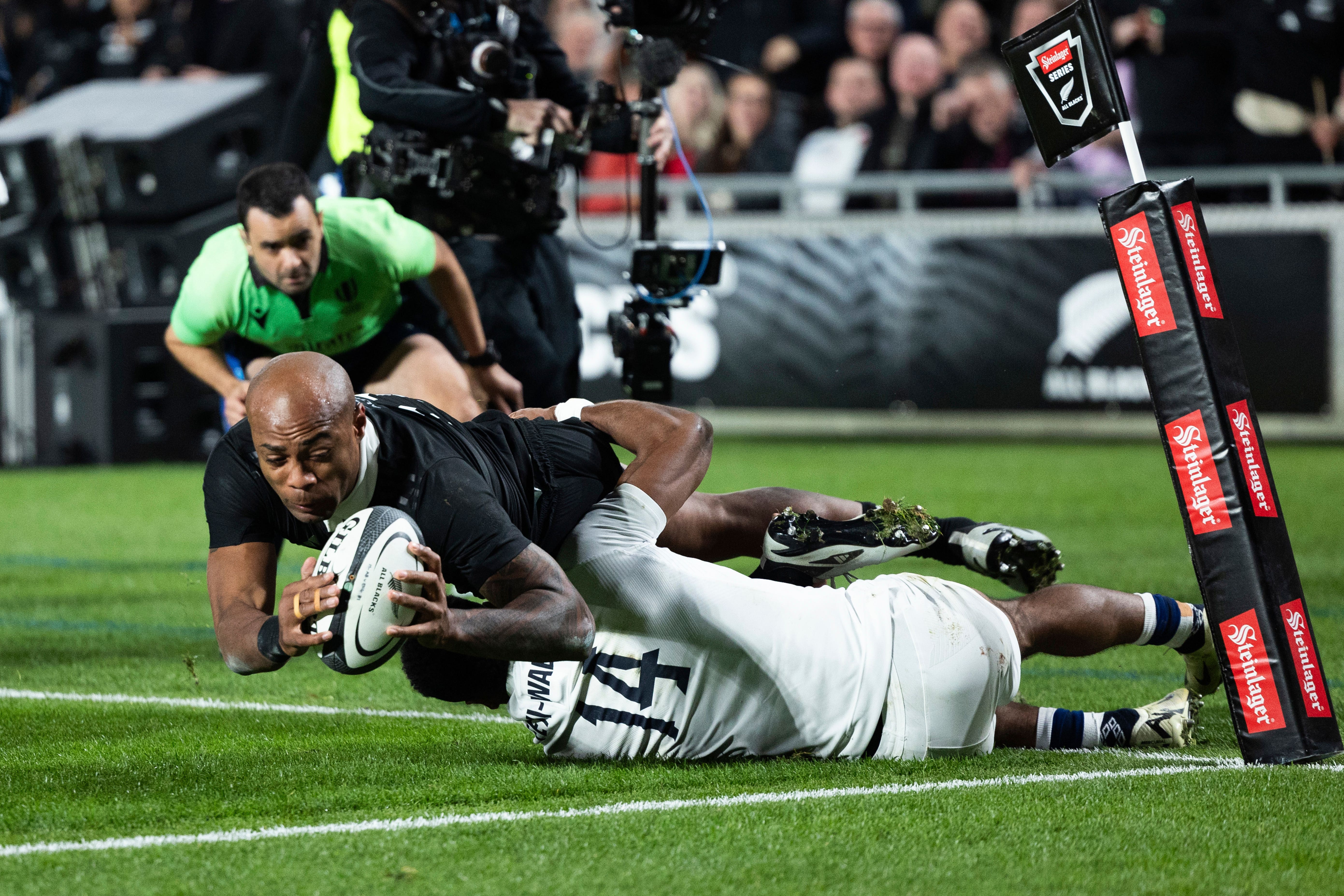 Mark Telea scored twice to take the All Blacks to victory