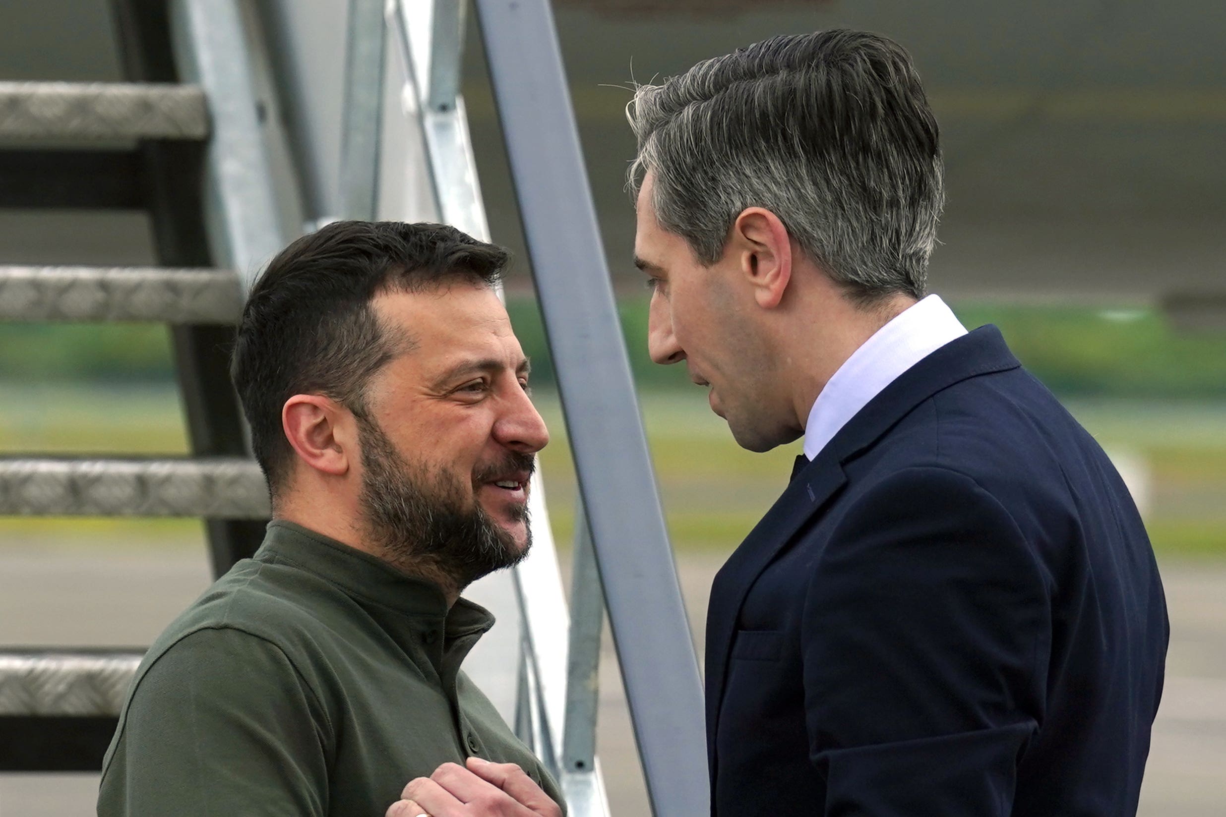 Taoiseach Simon Harris greets Ukrainian President Volodymyr Zelensky at Shannon Airport, Co Clare (Brian Lawless/PA)