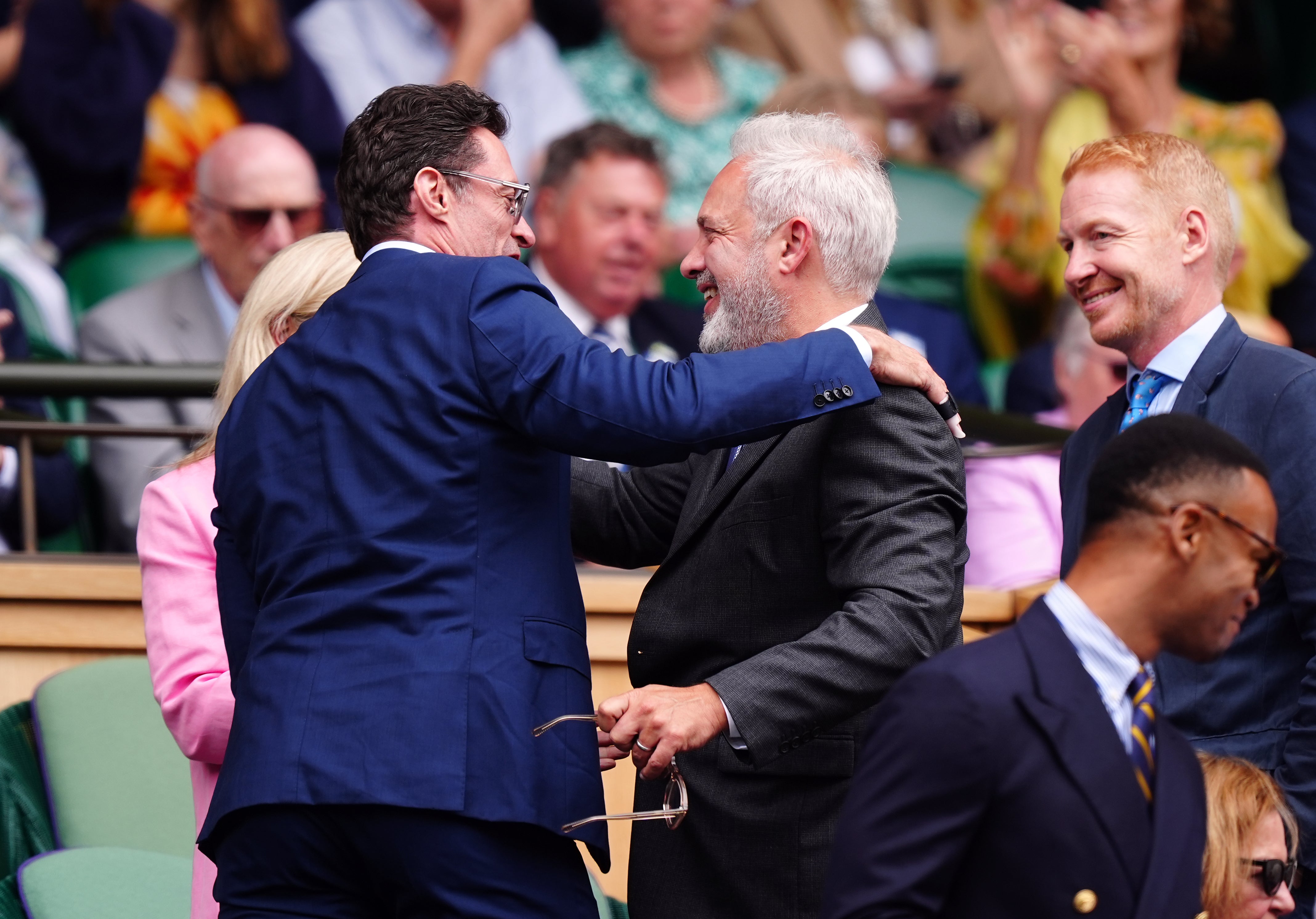 Hugh Jackman and Sir Sam Mendes in the royal box on day 13 of the 2024 Wimbledon Championships (PA/ Mike Egerton)