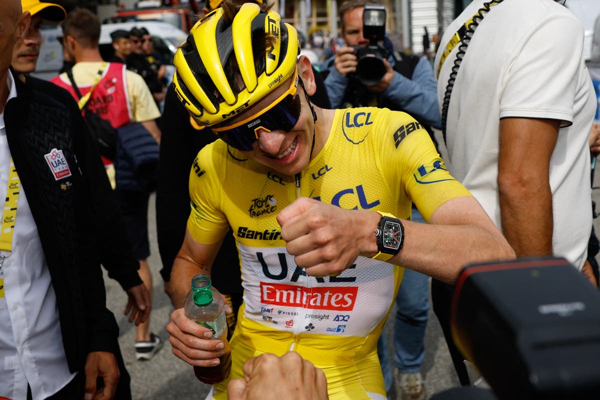 Tadej Pogacar wins wild stage after fan throws crisps in Tour de France leader’s face