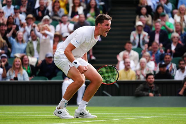 Henry Patten reacts after winning the second set with Harri Heliovaara (not pictured) against Max Purcell and Jordan Thompson on day thirteen of the 2024 Wimbledon Championships at the All England Lawn Tennis and Croquet Club, London. Picture date: Saturday July 13, 2024.