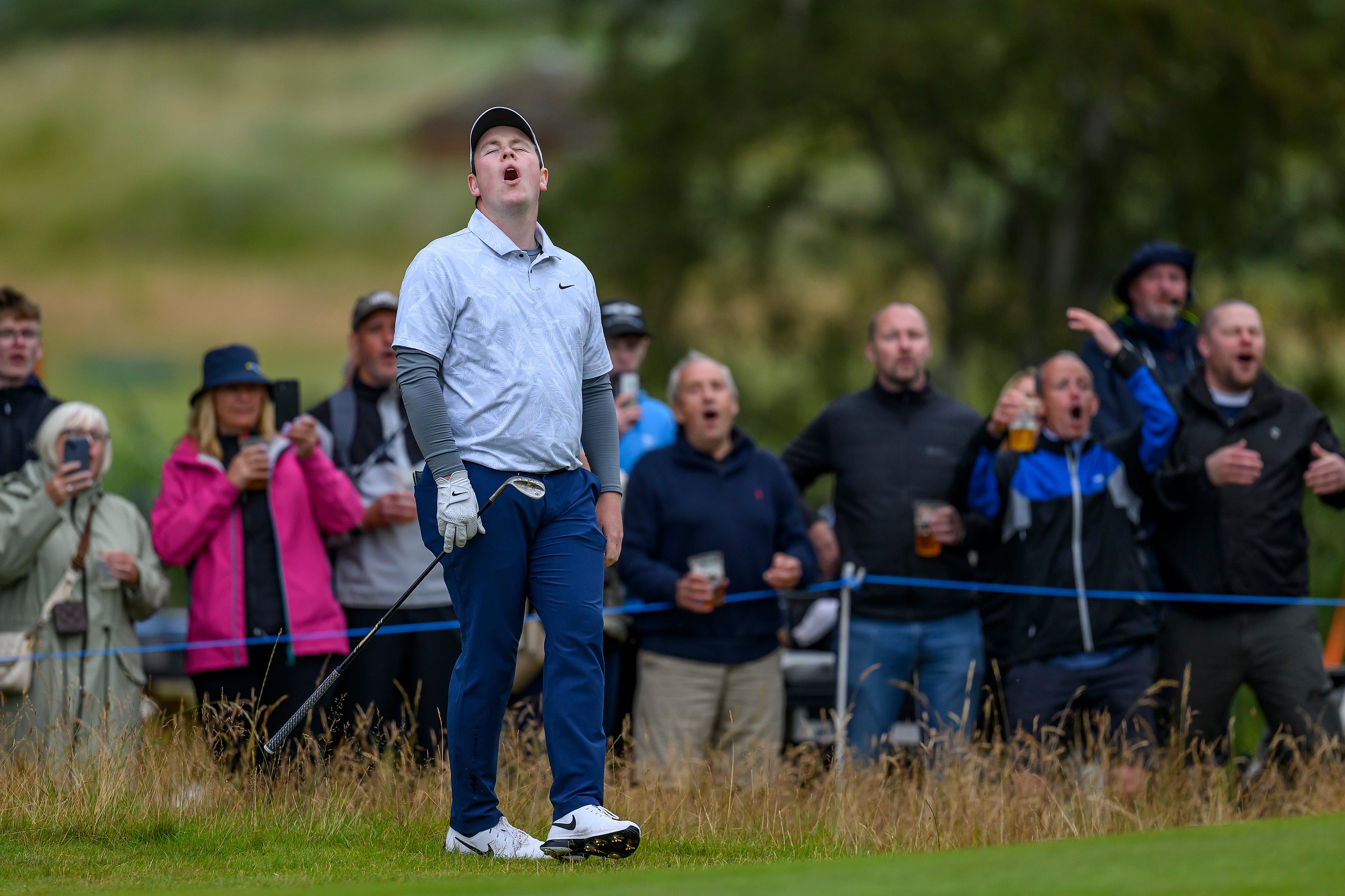 Robert MacIntyre reacts on the 17th hole during day three of the Genesis Scottish Open (Malcolm Mackenzie/PA)