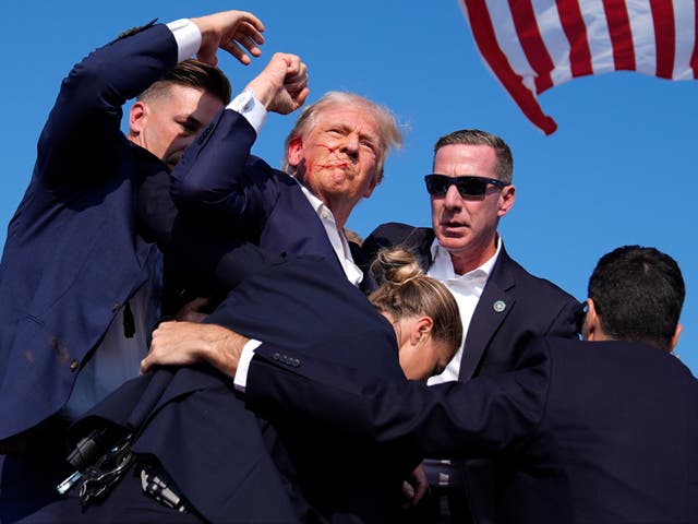 <p>Donald Trump is  bundled off stage by Secret Service agents at a campaign rally on July 13, 2024, in Butler, Pa</p>