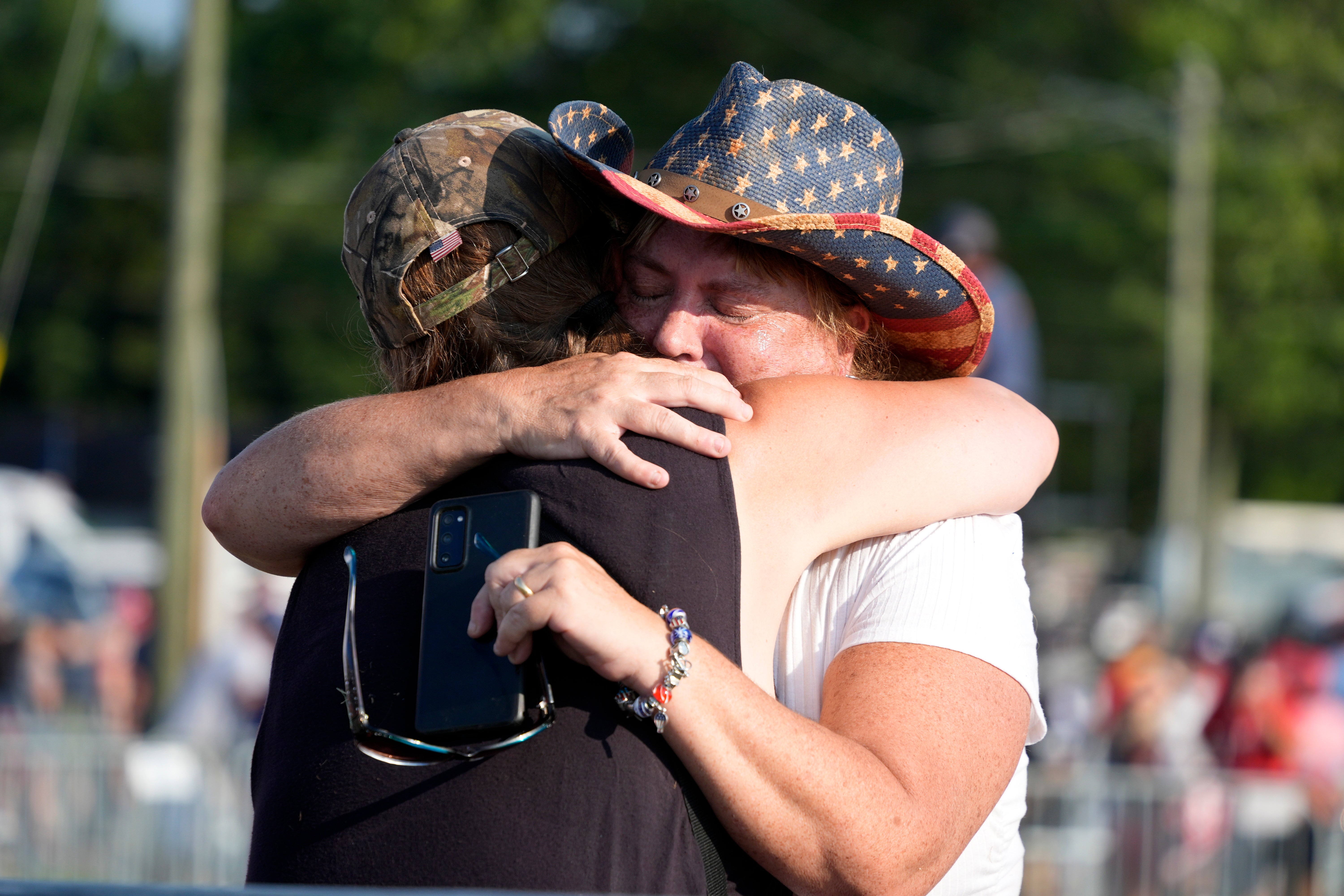 Audience members hugged and consoled each other after the shooting. People had yelled at others to ‘get down’ as the shots were heard