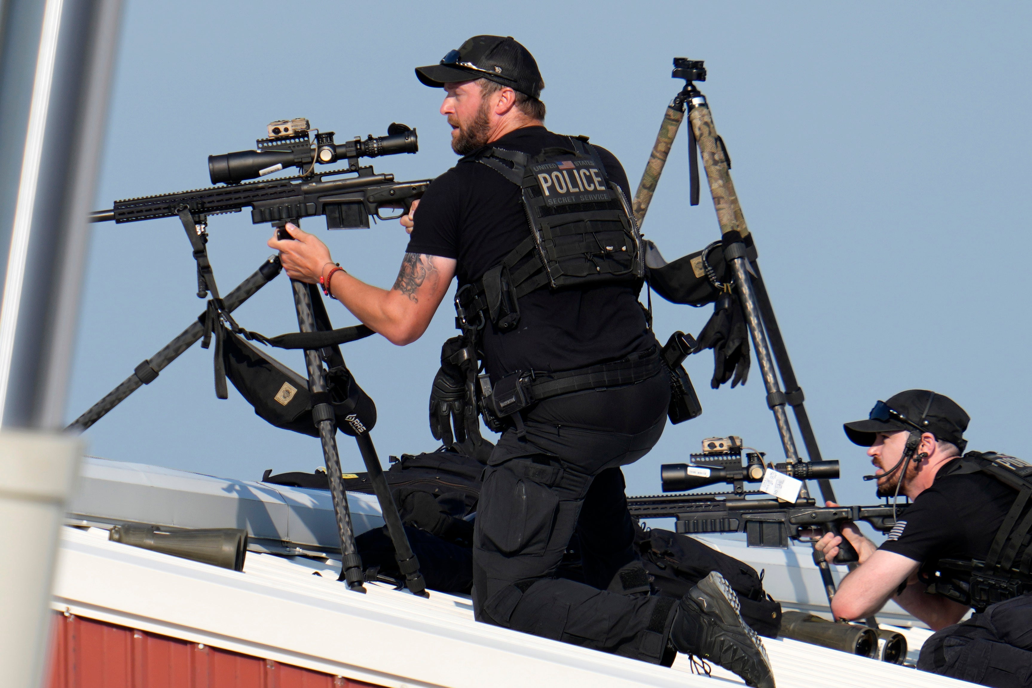 Police snipers return fire after shots were fired while Republican presidential candidate former President Donald Trump was speaking at a campaign event in Butler, Pennsylvania