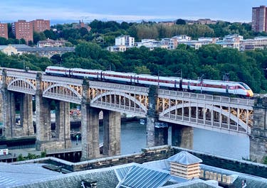 <p>Tyne for a drink: LNER train heading south from Newcastle, with the bar now open</p>