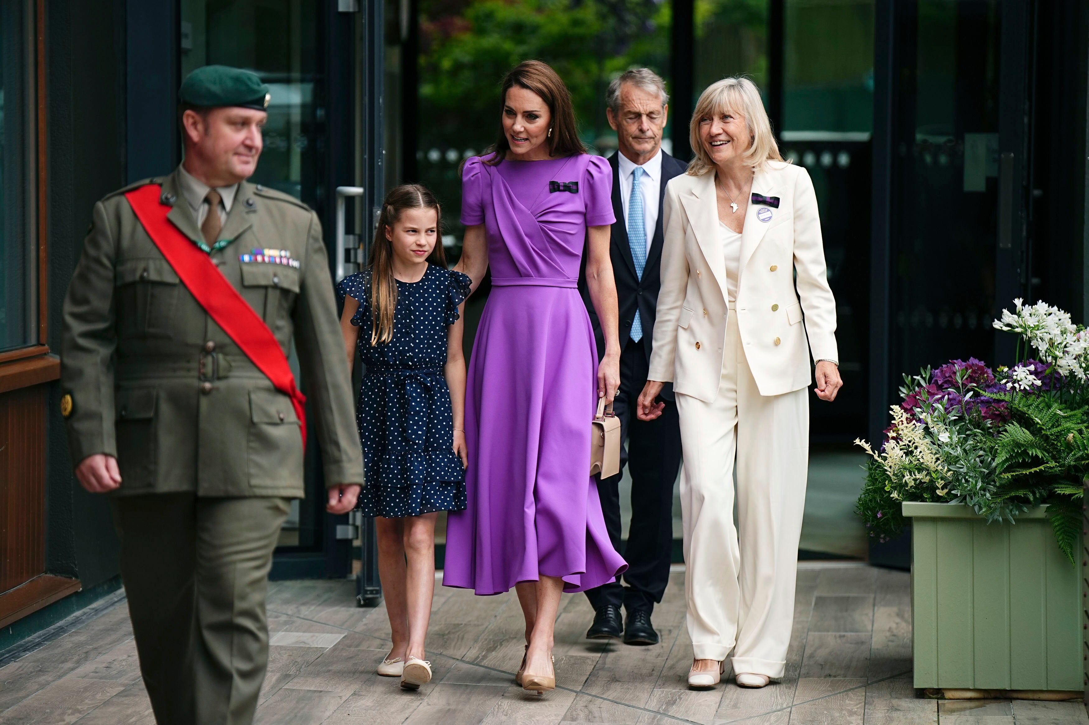 The Princess of Wales and Princess Charlotte arrive to attend the men's singles final match