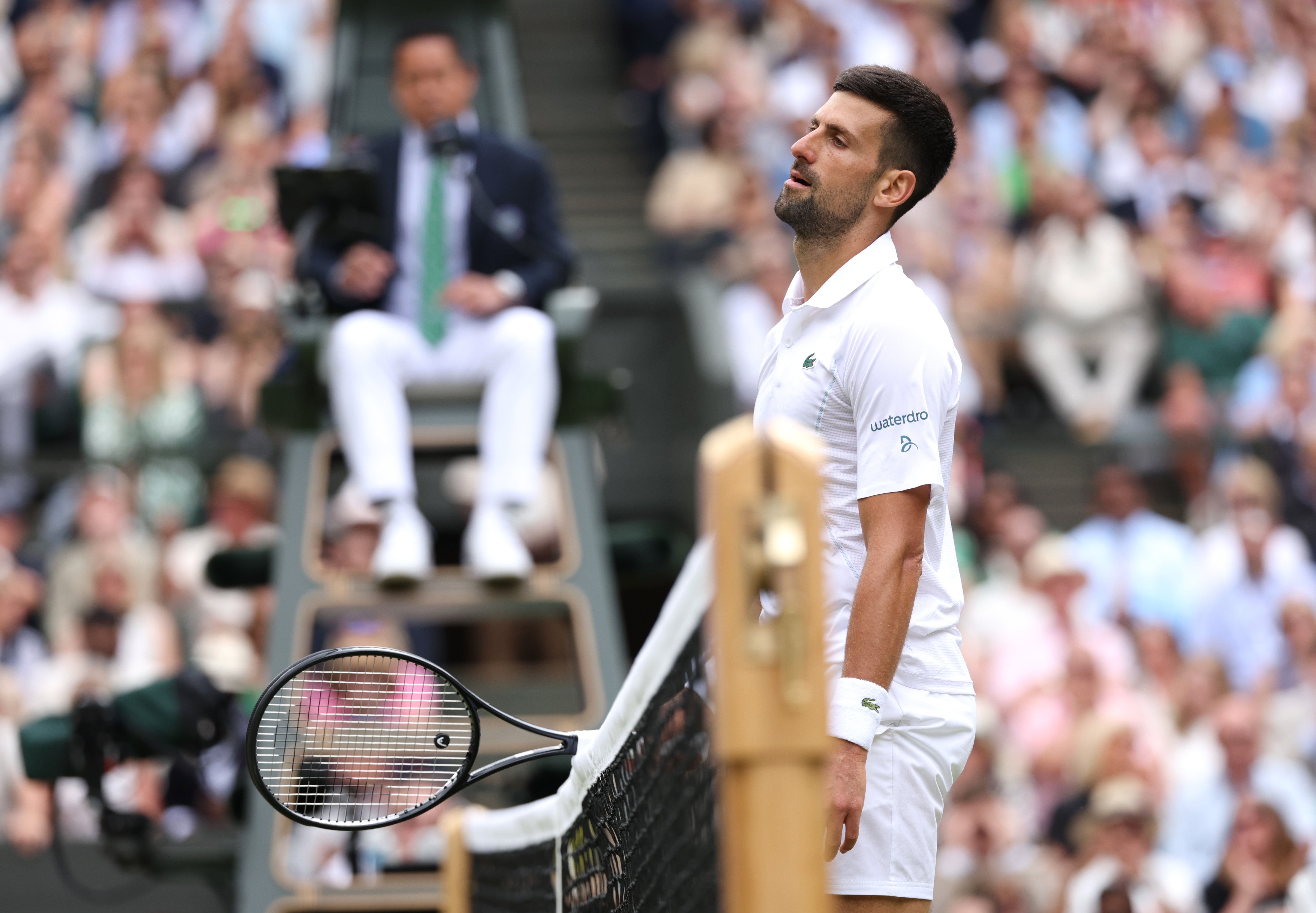 Novak Djokovic was beaten in straight sets on Centre Court