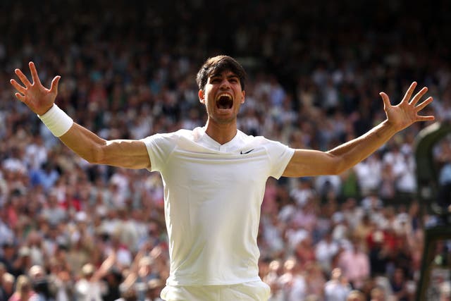 <p>Carlos Alcaraz celebrates his second Wimbledon title </p>