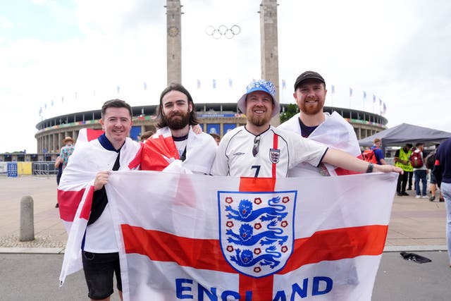 <p>England fans outside the Olympiastadion in Berlin (Adam Davy/PA)</p>