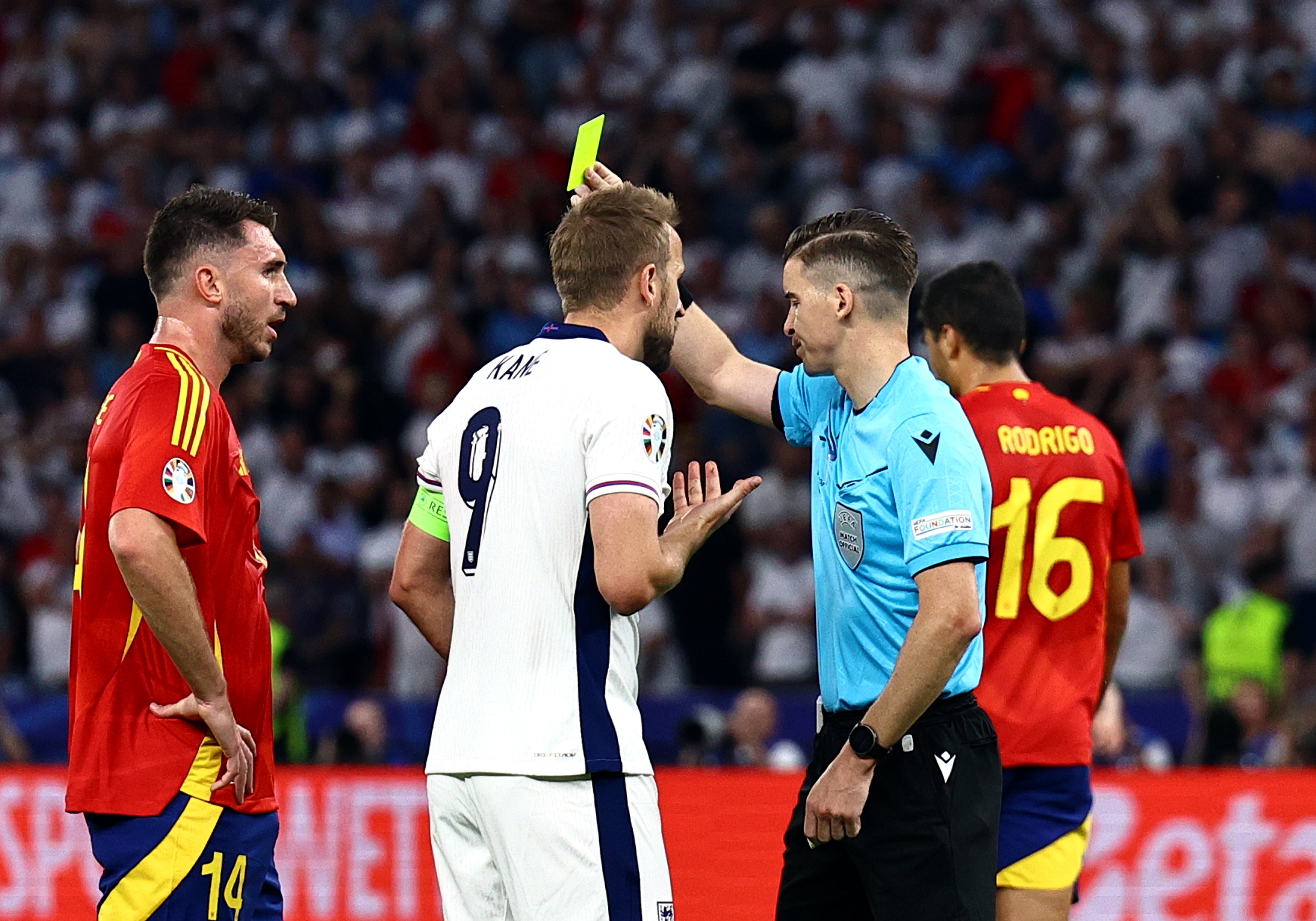 Harry Kane argues his case after a yellow card