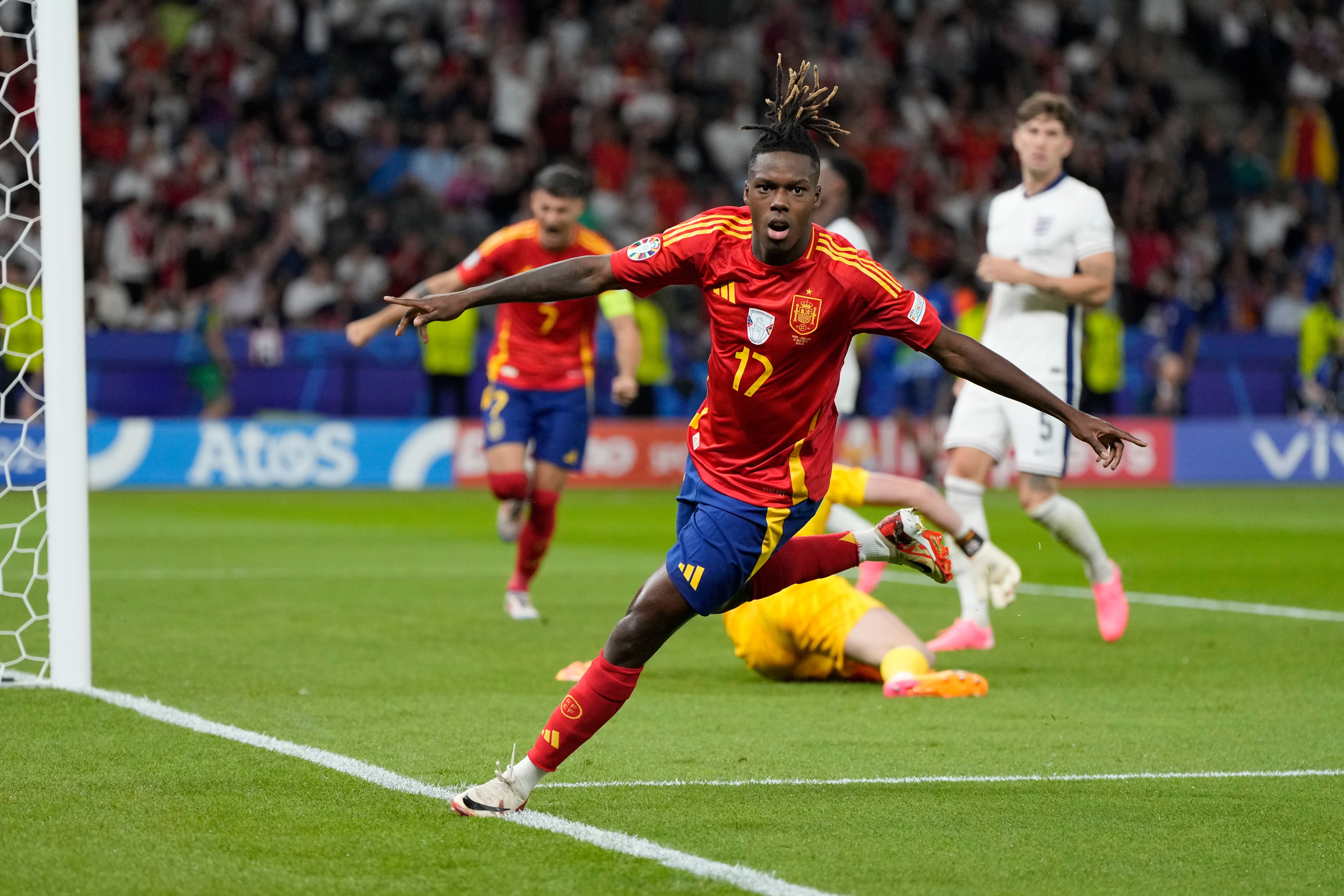 Williams celebrates after scoring for Spain