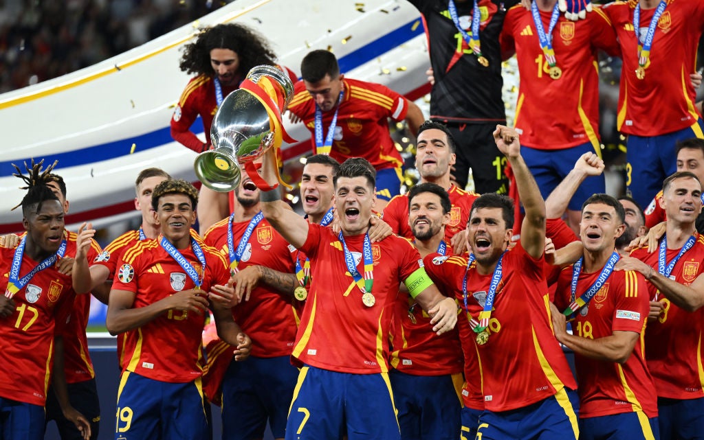 Spain raise the trophy aloft